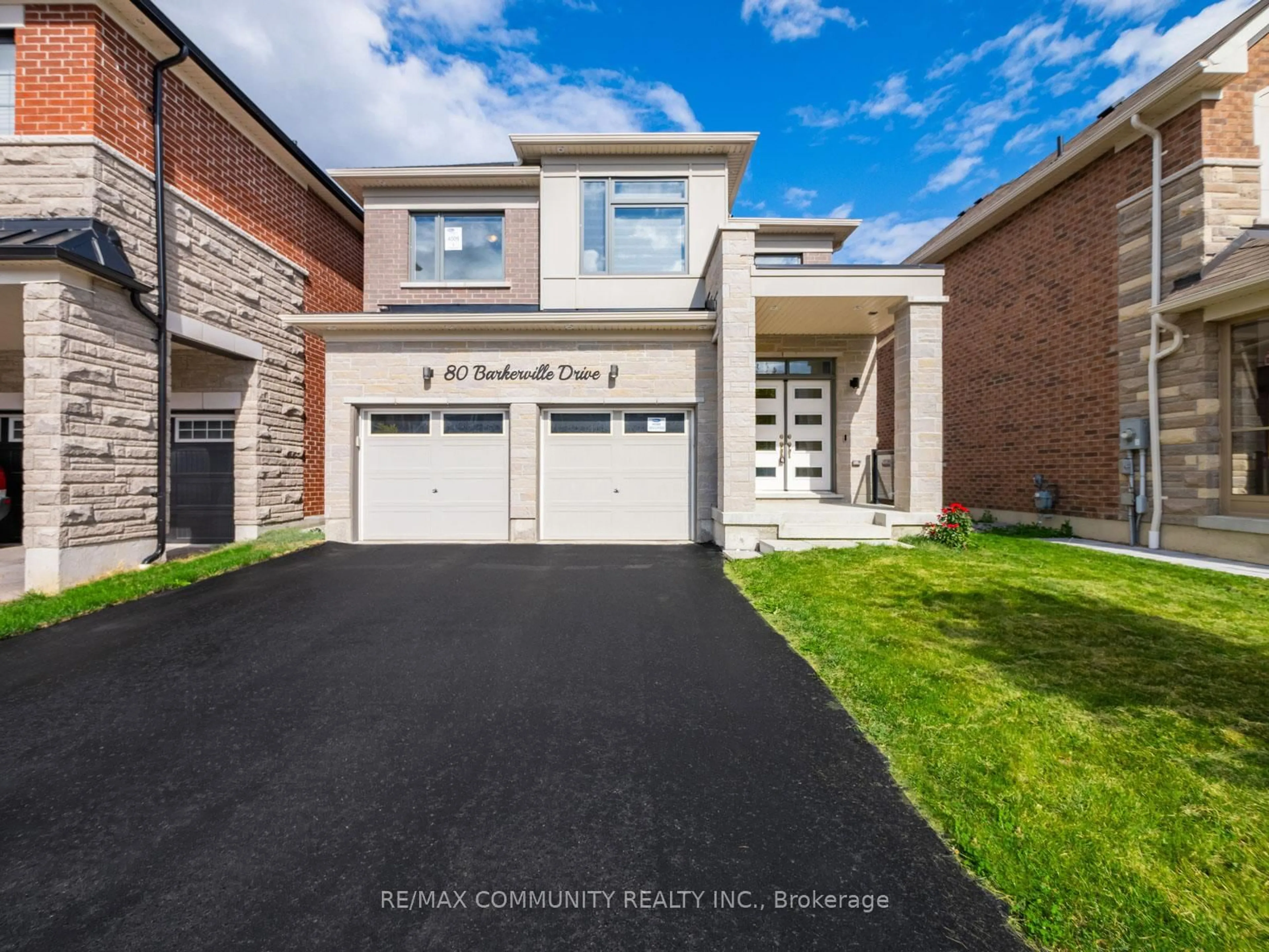 Home with brick exterior material, street for 80 Barkerville Dr, Whitby Ontario L1P 0L8
