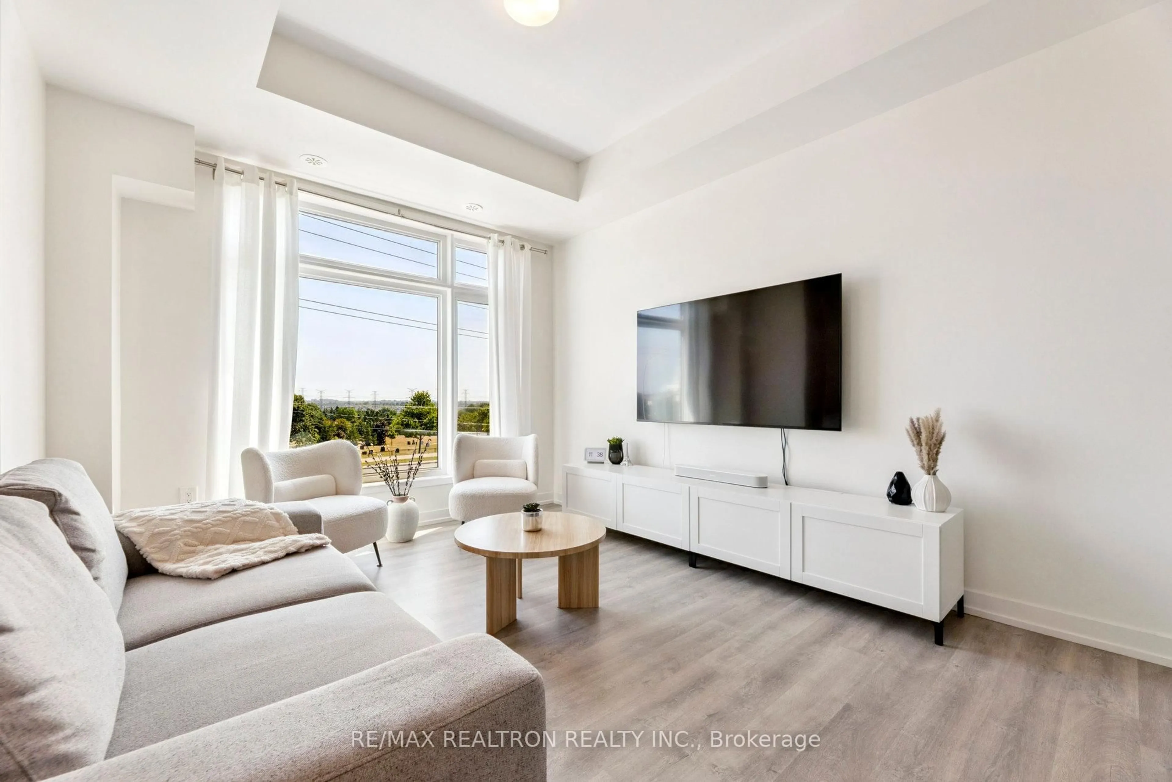Living room with furniture, unknown for 2550 Castlegate Crossing #418, Pickering Ontario L1X 0H6