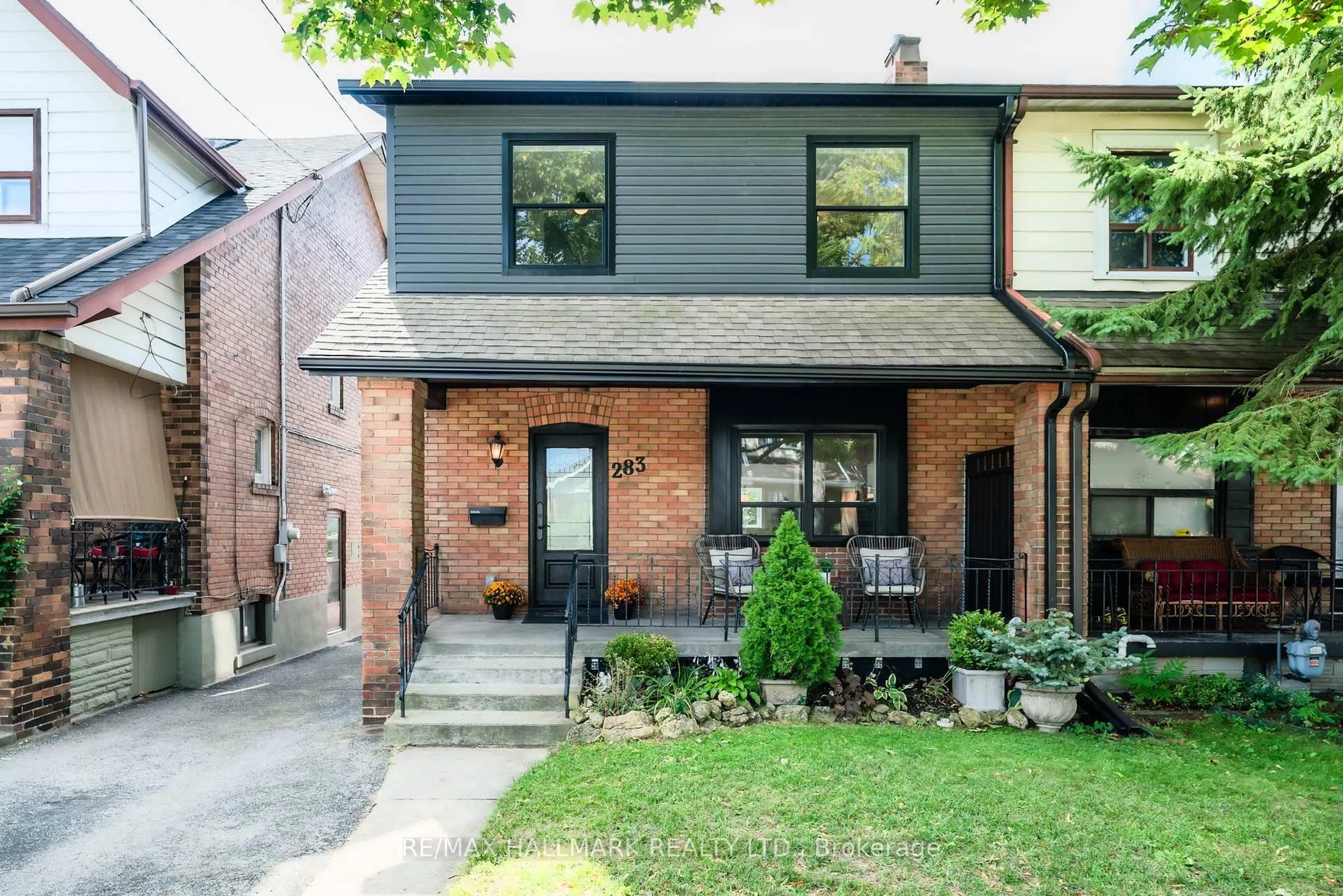 Home with brick exterior material, street for 283 Wolverleigh Blvd, Toronto Ontario M4C 1S3