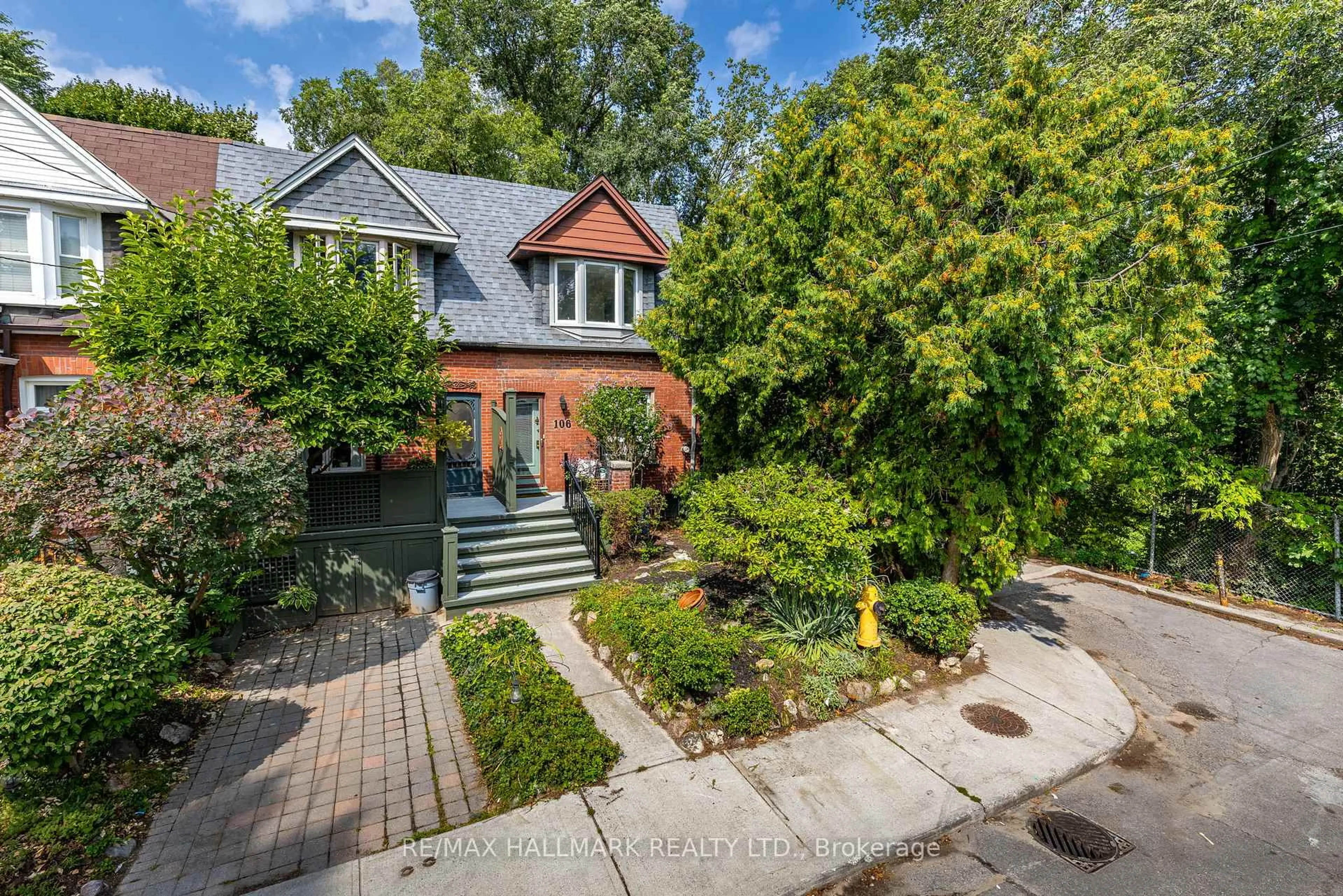 Home with brick exterior material, street for 106 Frizzell Ave, Toronto Ontario M4J 1E3