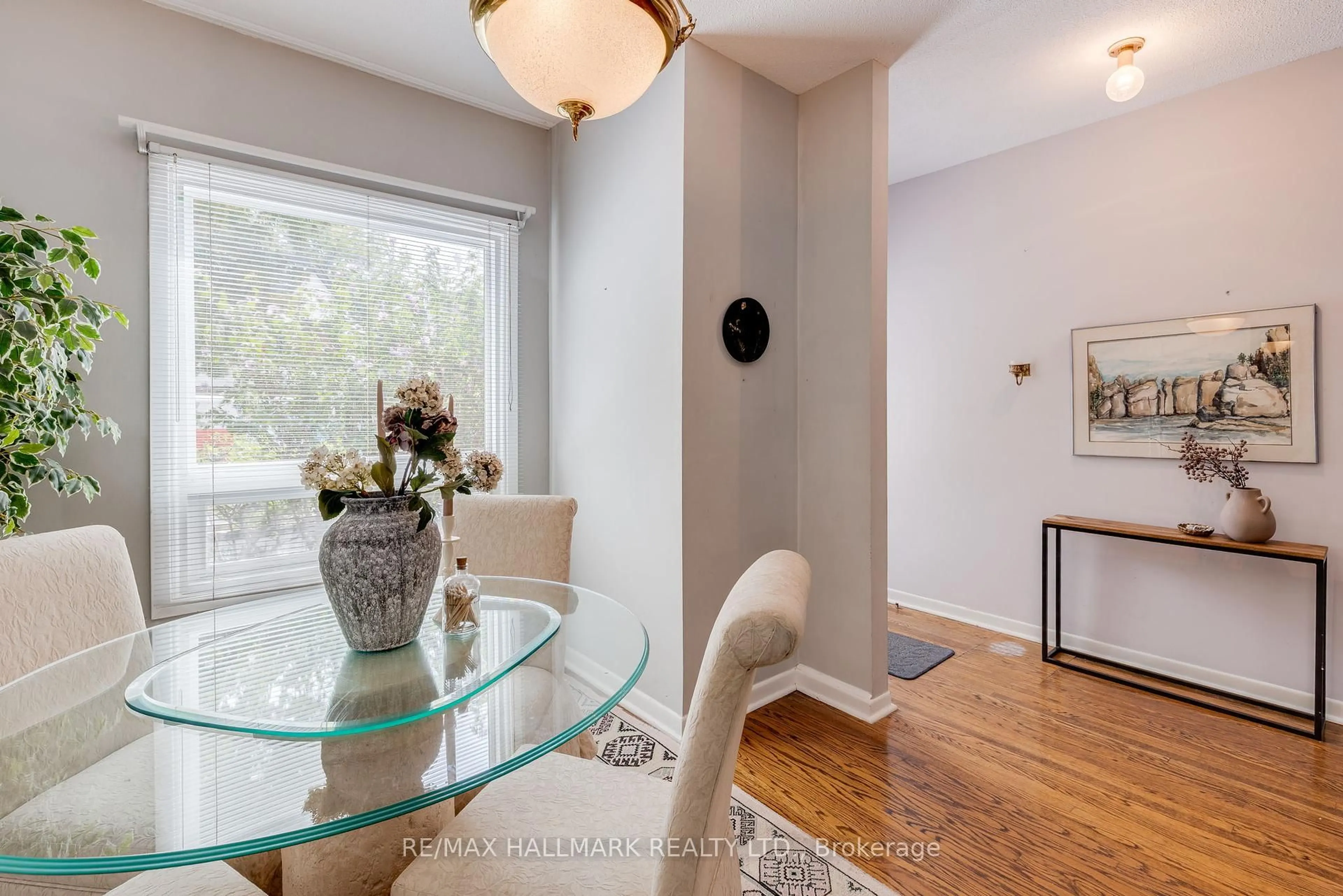 Dining room, wood/laminate floor for 106 Frizzell Ave, Toronto Ontario M4J 1E3