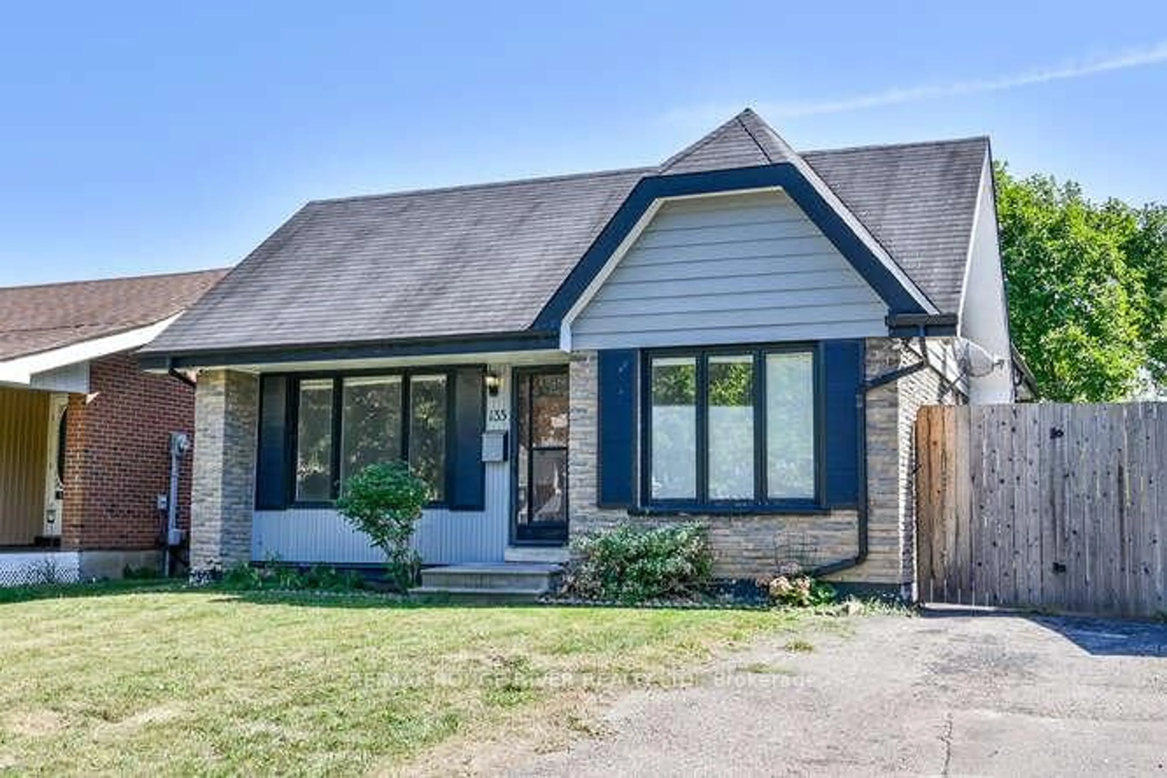 Home with brick exterior material, street for 135 Calais St, Whitby Ontario L1N 5M3