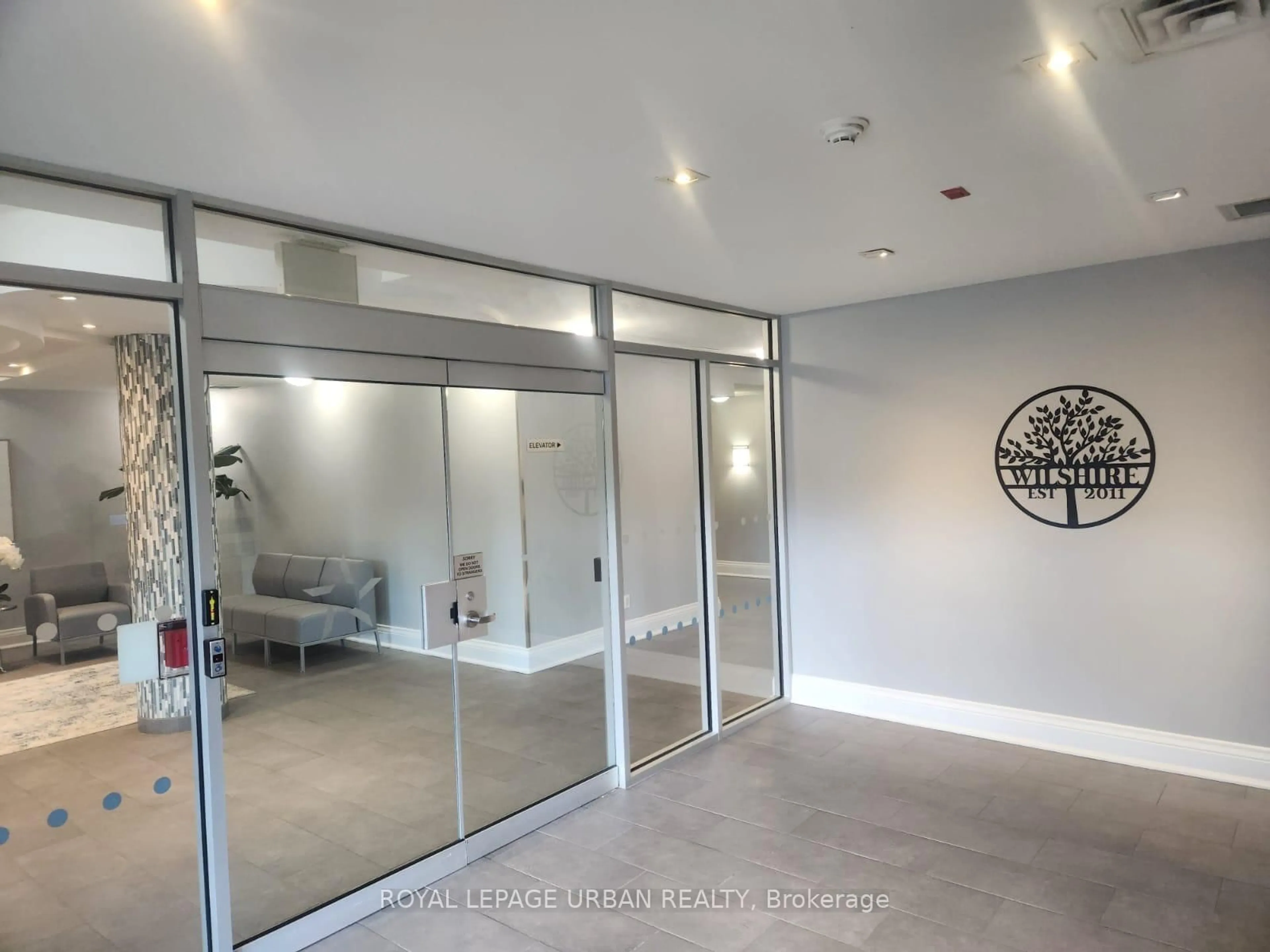 Indoor foyer for 60 Fairfax Cres #211, Toronto Ontario M1L 0E1