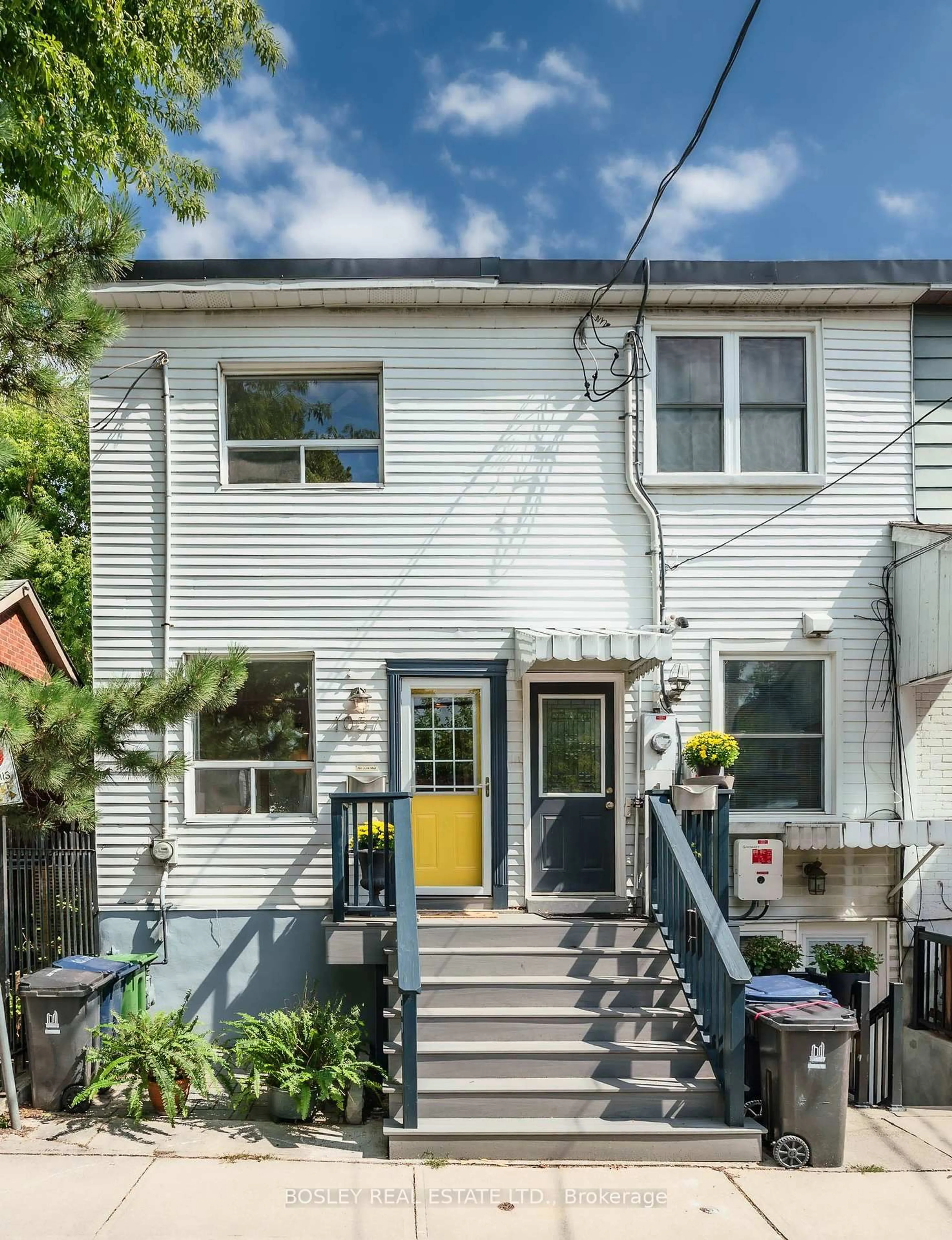 Home with vinyl exterior material, street for 1057 Craven Rd, Toronto Ontario M4J 4V7