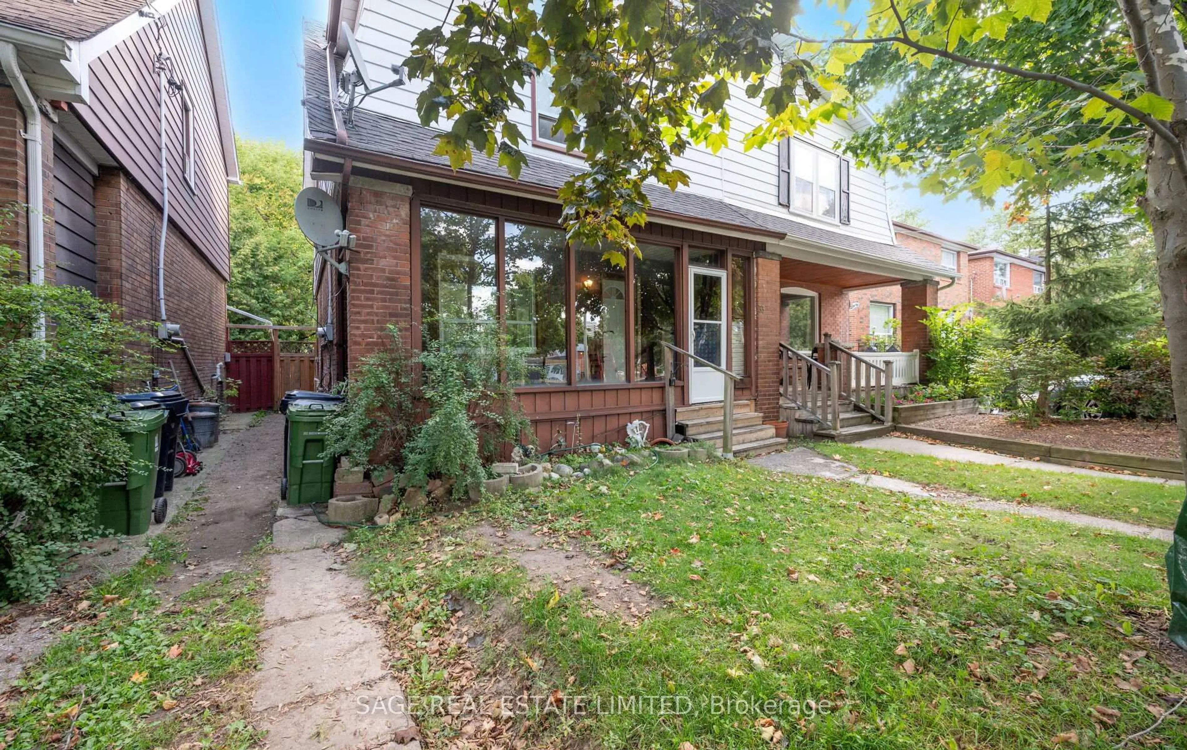 Home with brick exterior material, street for 33 Avonlea Blvd, Toronto Ontario M4C 5E4