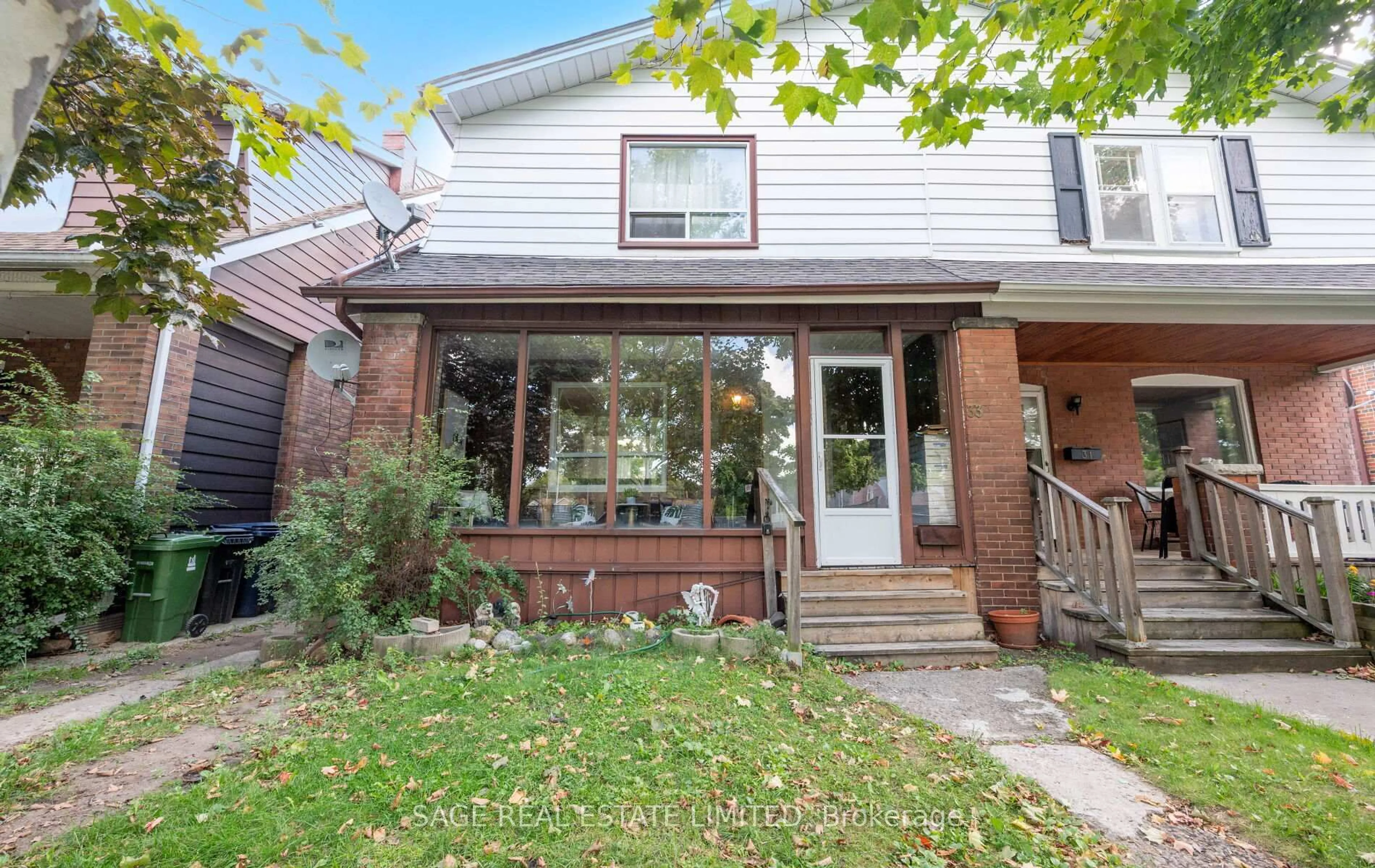 Home with brick exterior material, street for 33 Avonlea Blvd, Toronto Ontario M4C 5E4