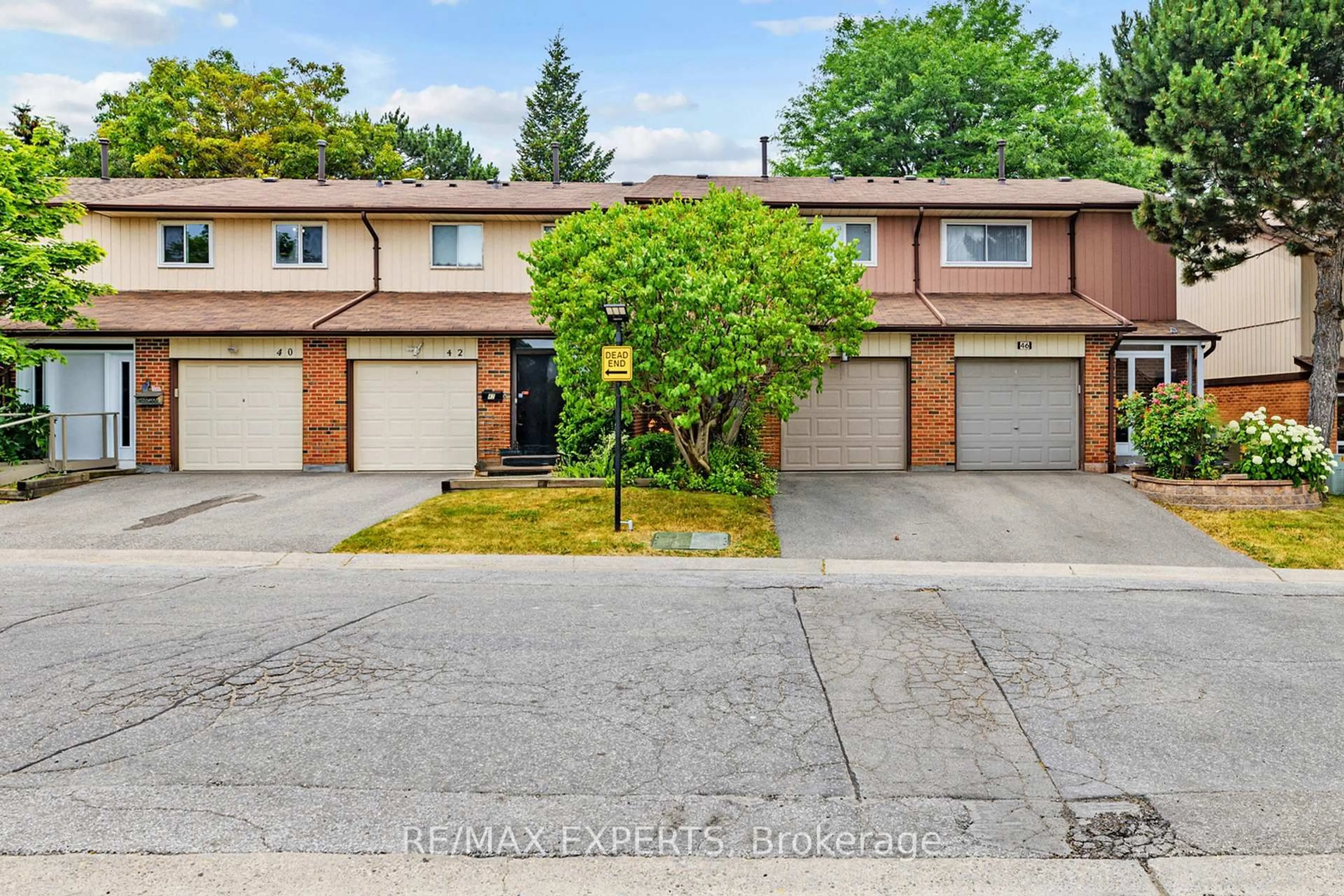 A pic from outside/outdoor area/front of a property/back of a property/a pic from drone, street for 30 Dundalk Dr #44, Toronto Ontario M1P 2W5