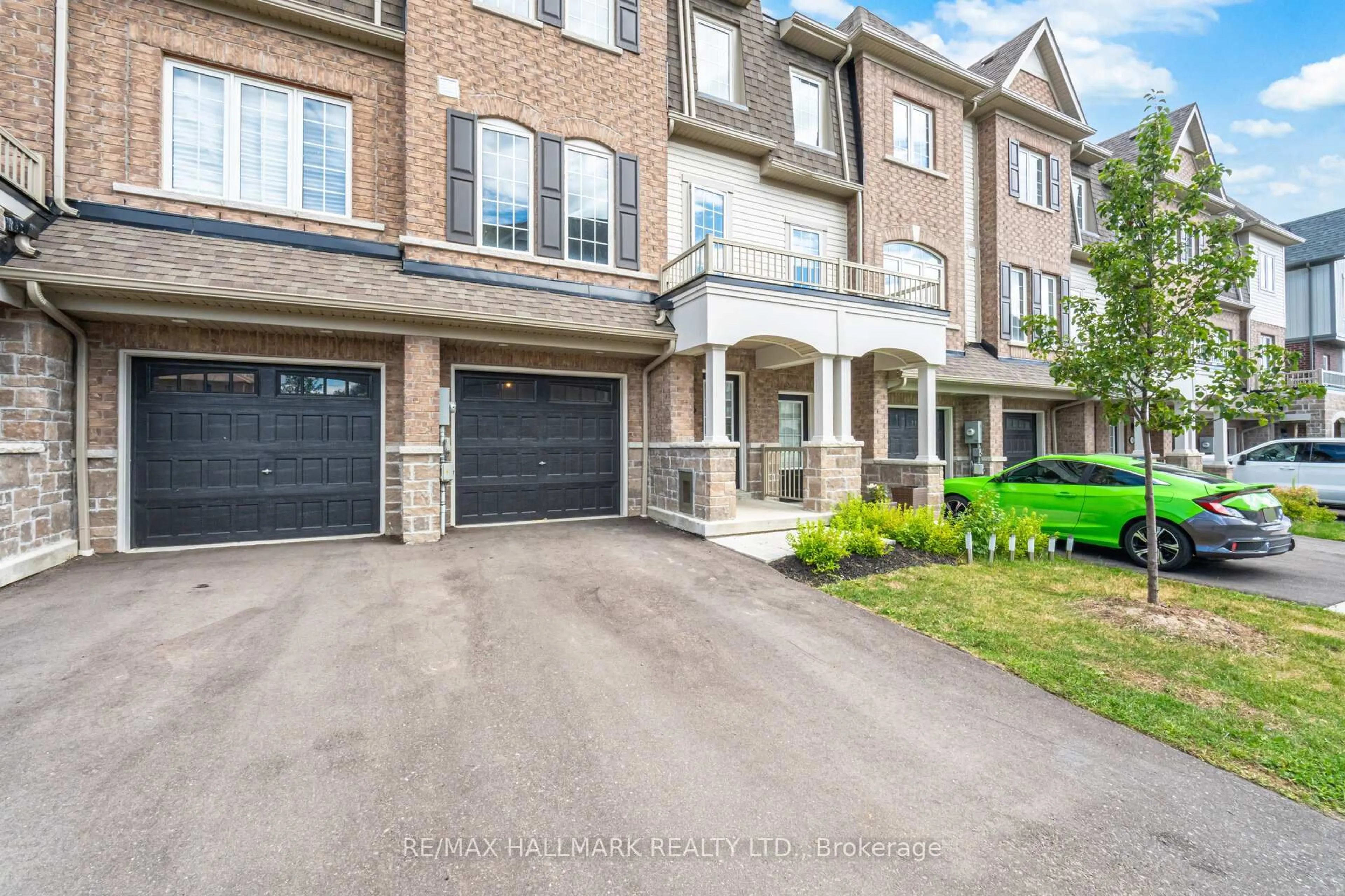 Home with brick exterior material, street for 148 Honey Crisp Lane, Clarington Ontario L1C 7H7