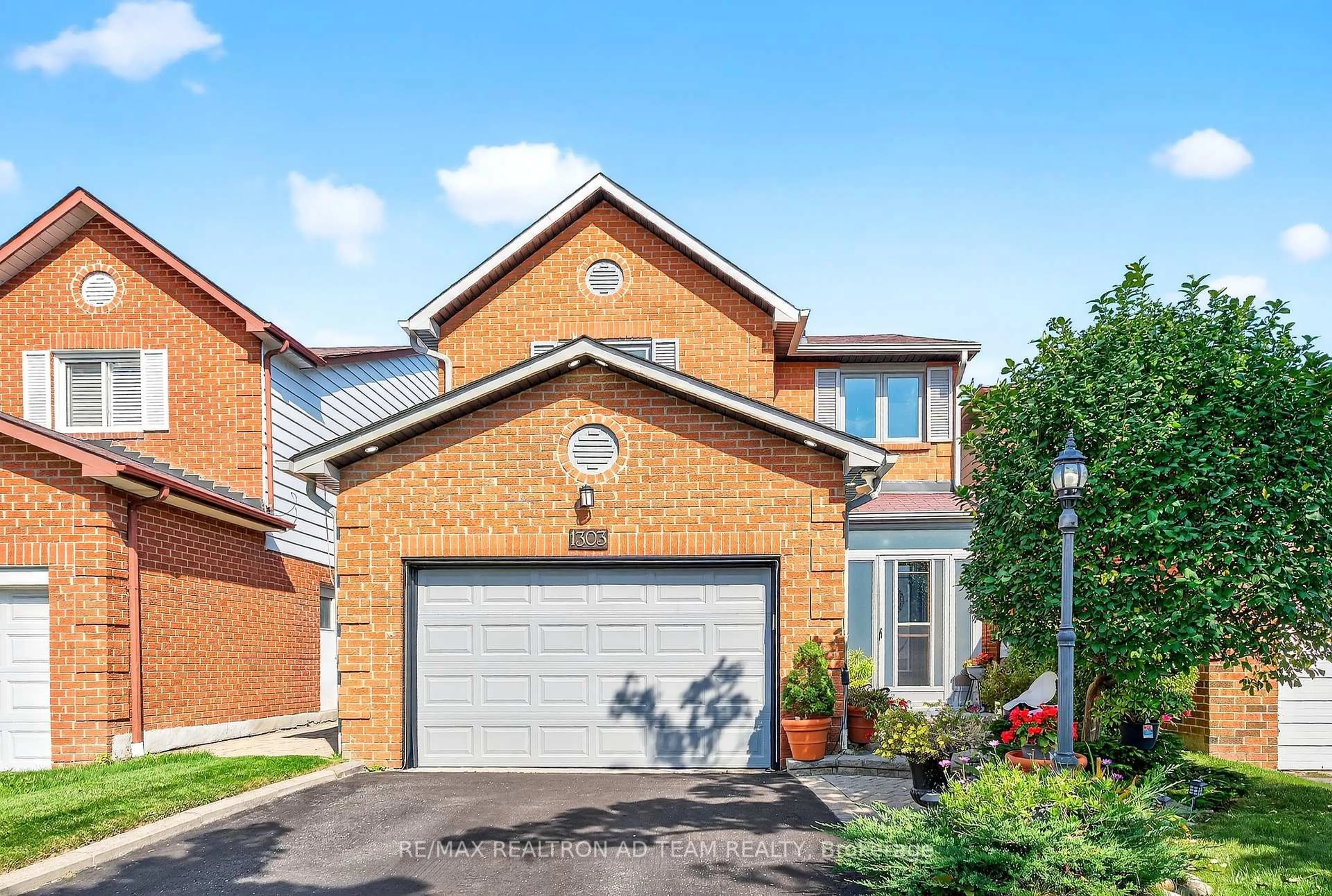 Home with brick exterior material, street for 1303 Redwood Lane, Pickering Ontario L1X 1C4