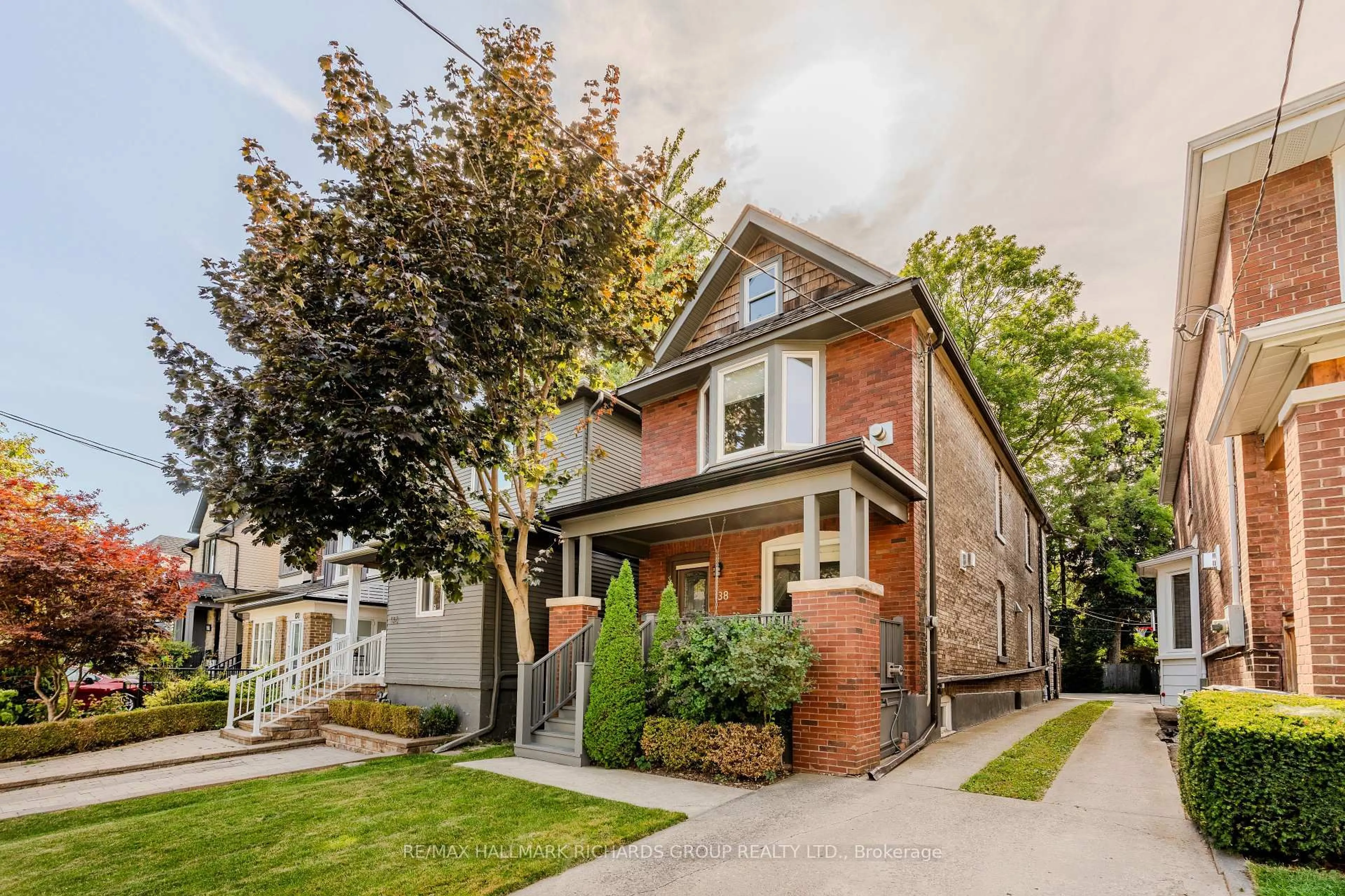 Home with brick exterior material, street for 138 Ashdale Ave, Toronto Ontario M4L 2Y9