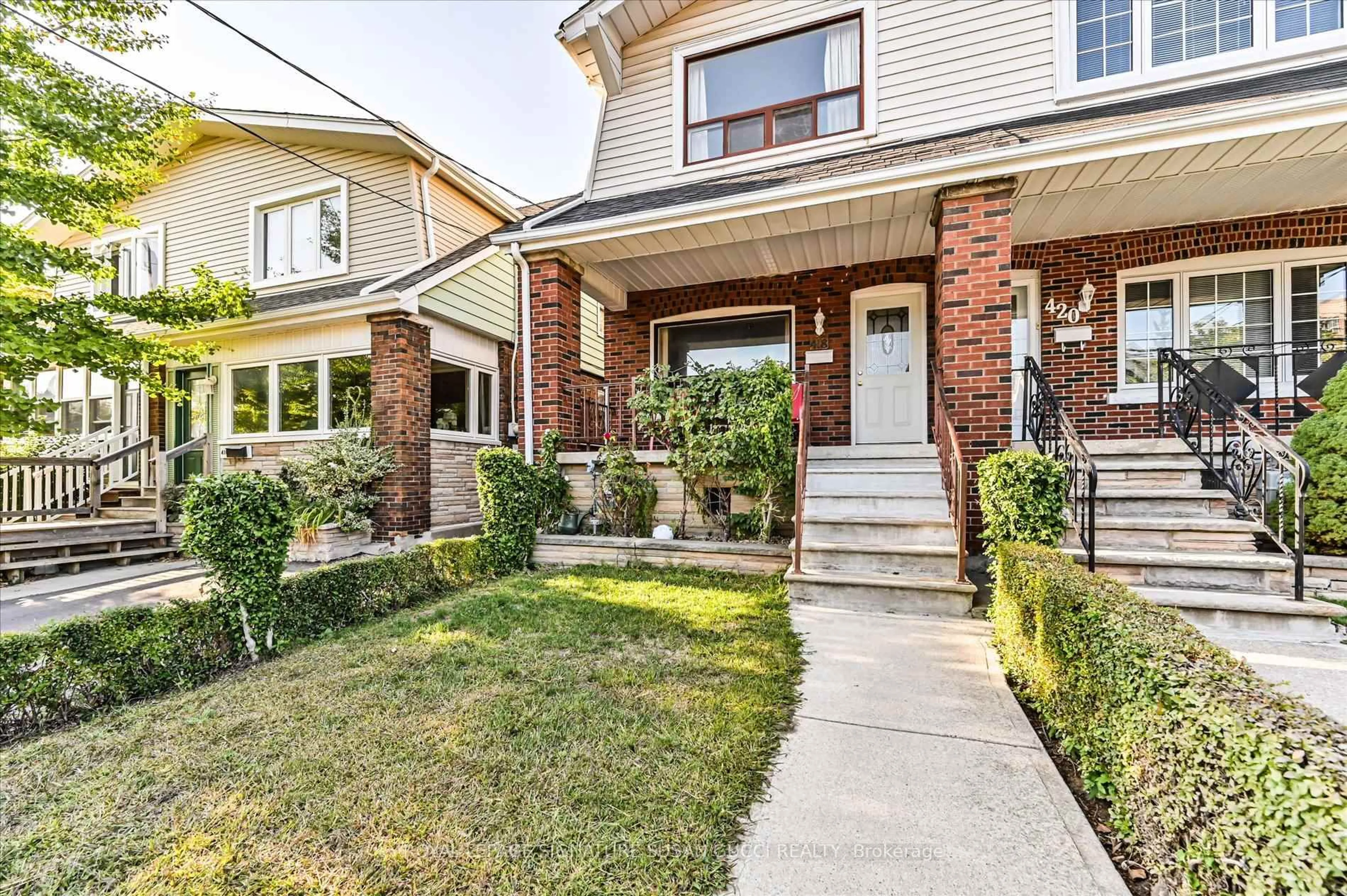 Home with brick exterior material, street for 418 Sammon Ave, Toronto Ontario M4J 2B1