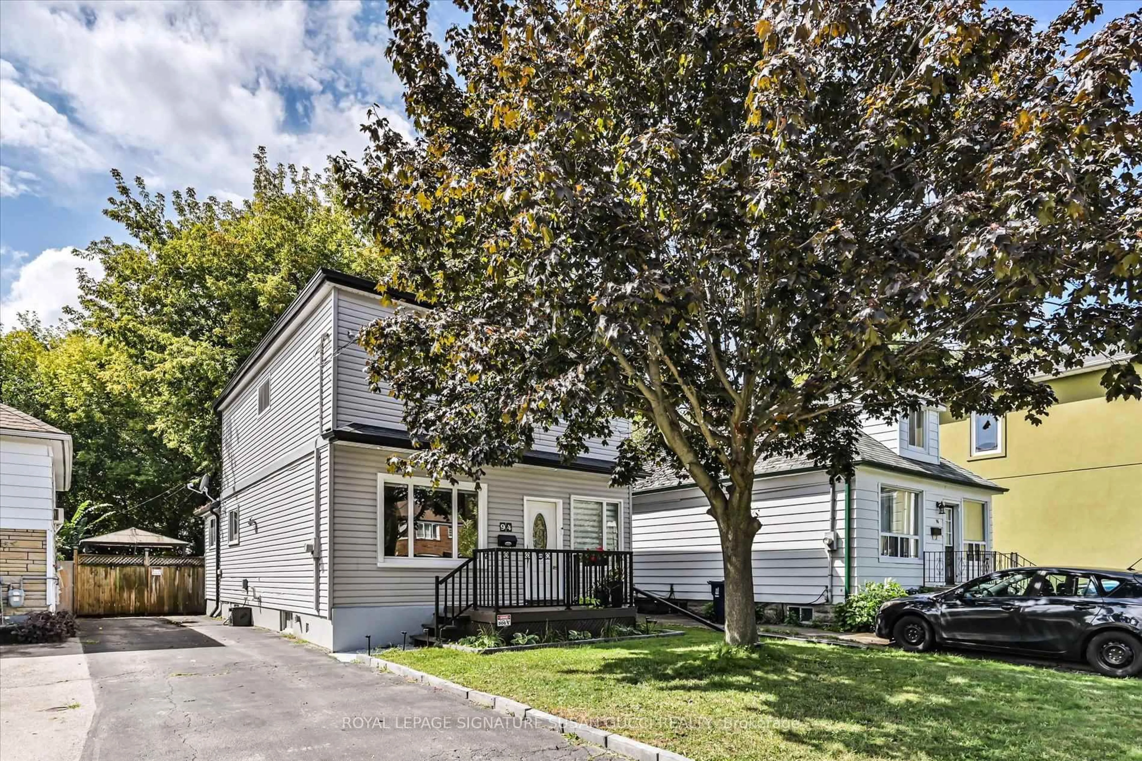 Home with vinyl exterior material, street for 94 Meighen Ave, Toronto Ontario M4B 2H7