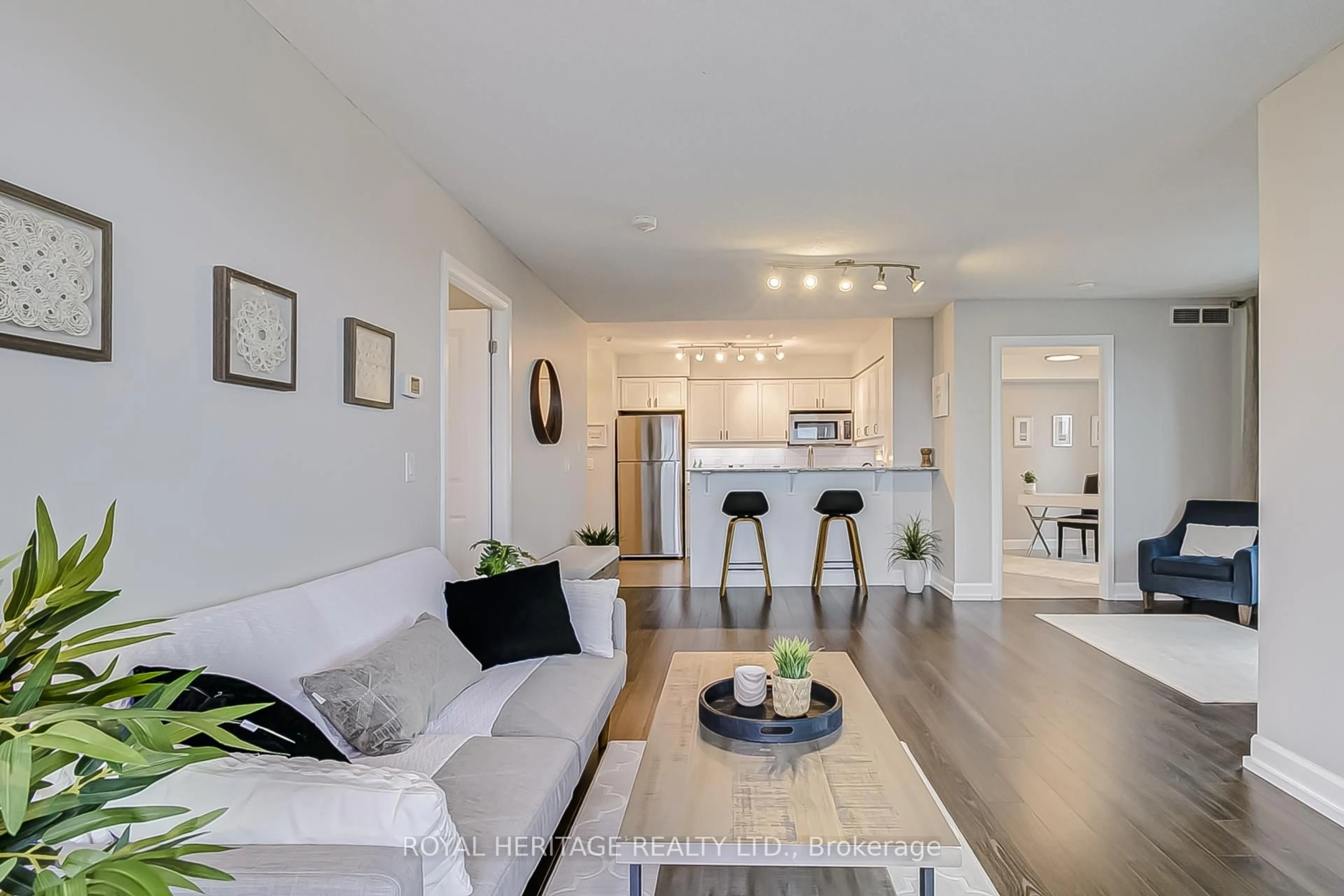 Living room with furniture, wood/laminate floor for 1235 Bayly St #511, Pickering Ontario L1W 1L7