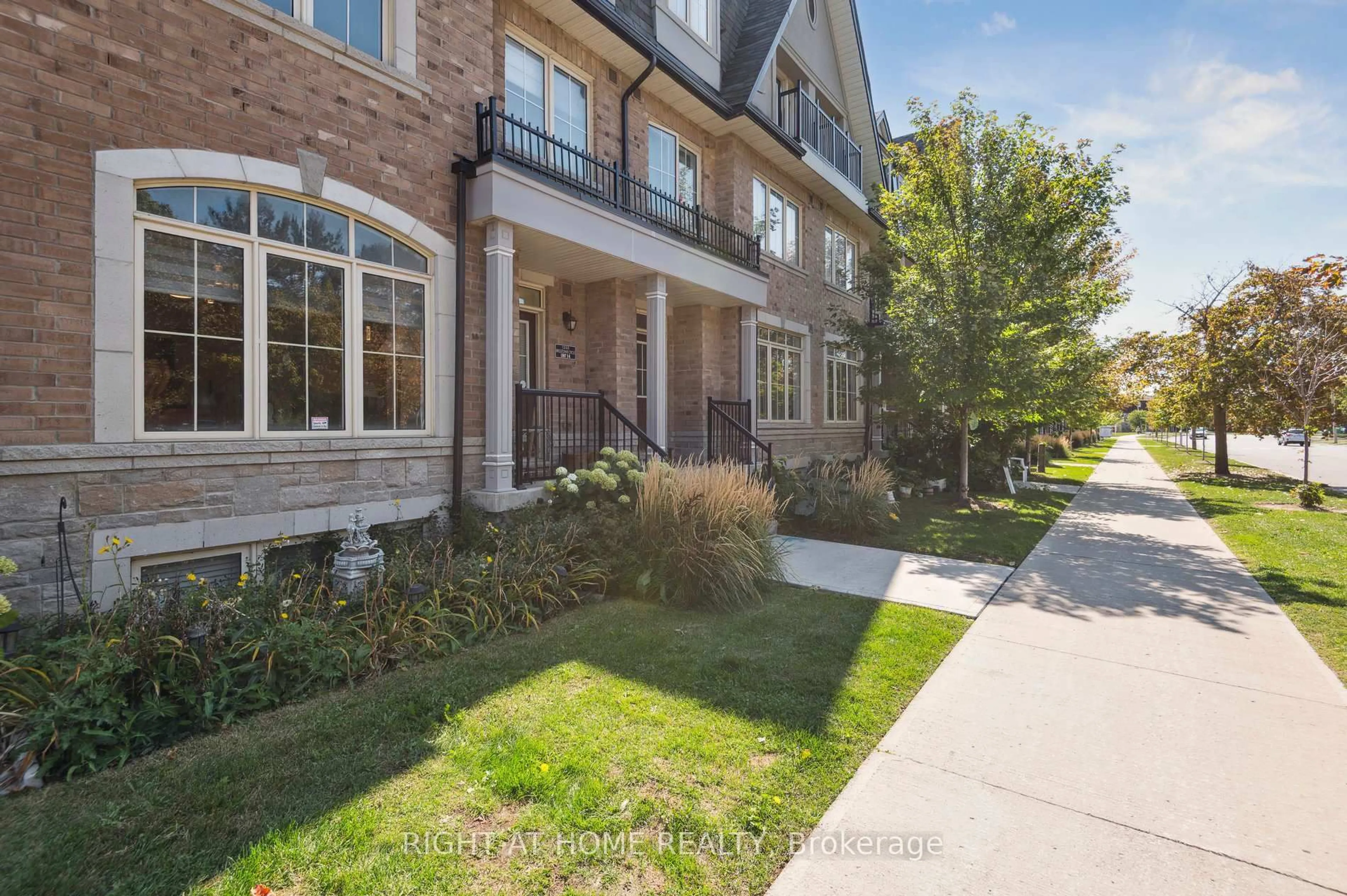 Home with brick exterior material, street for 1255 Bridletowne Circ #14, Toronto Ontario M1W 0A5