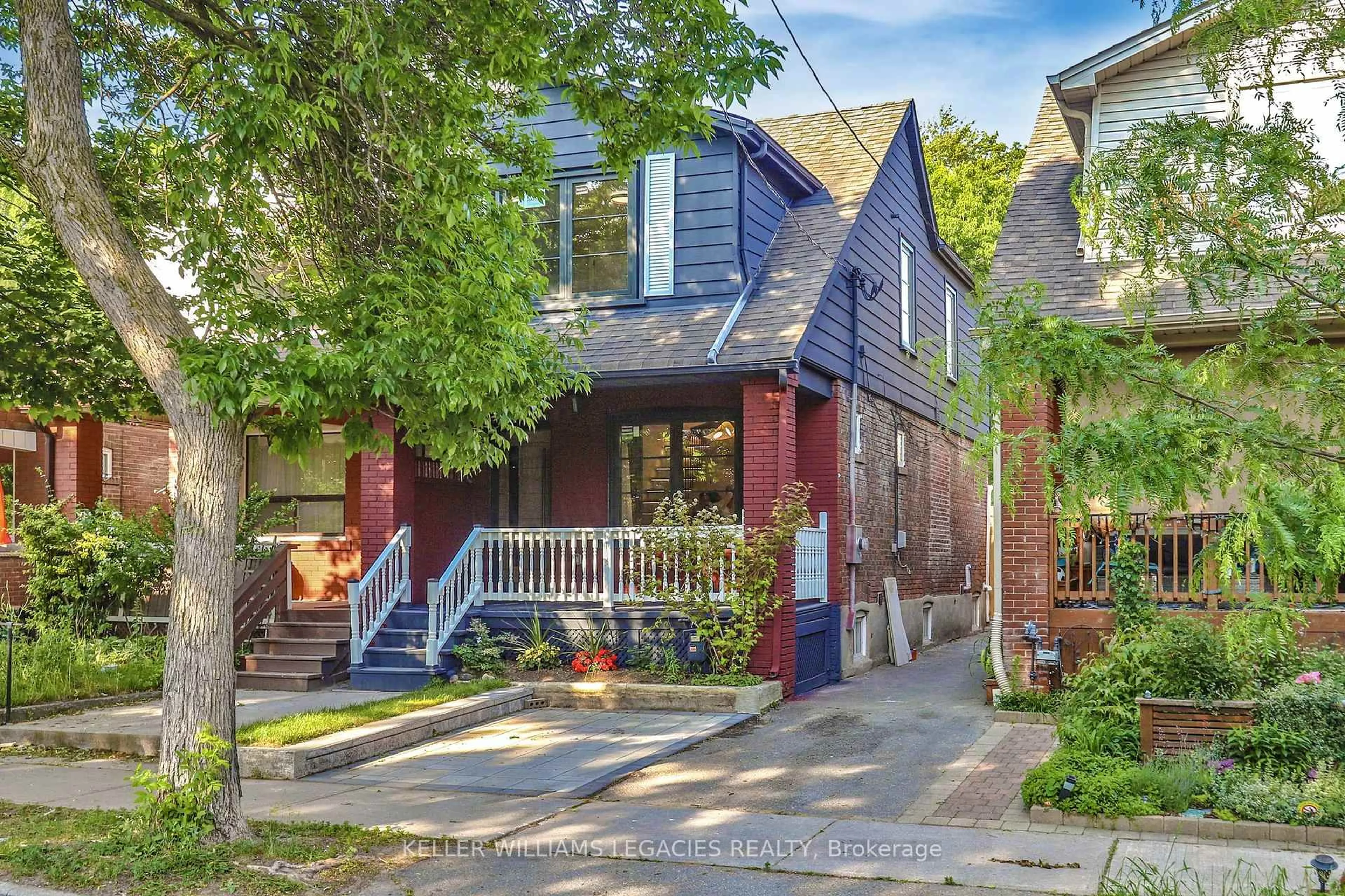 Home with brick exterior material, street for 117 Glebemount Ave, Toronto Ontario M4C 3R9