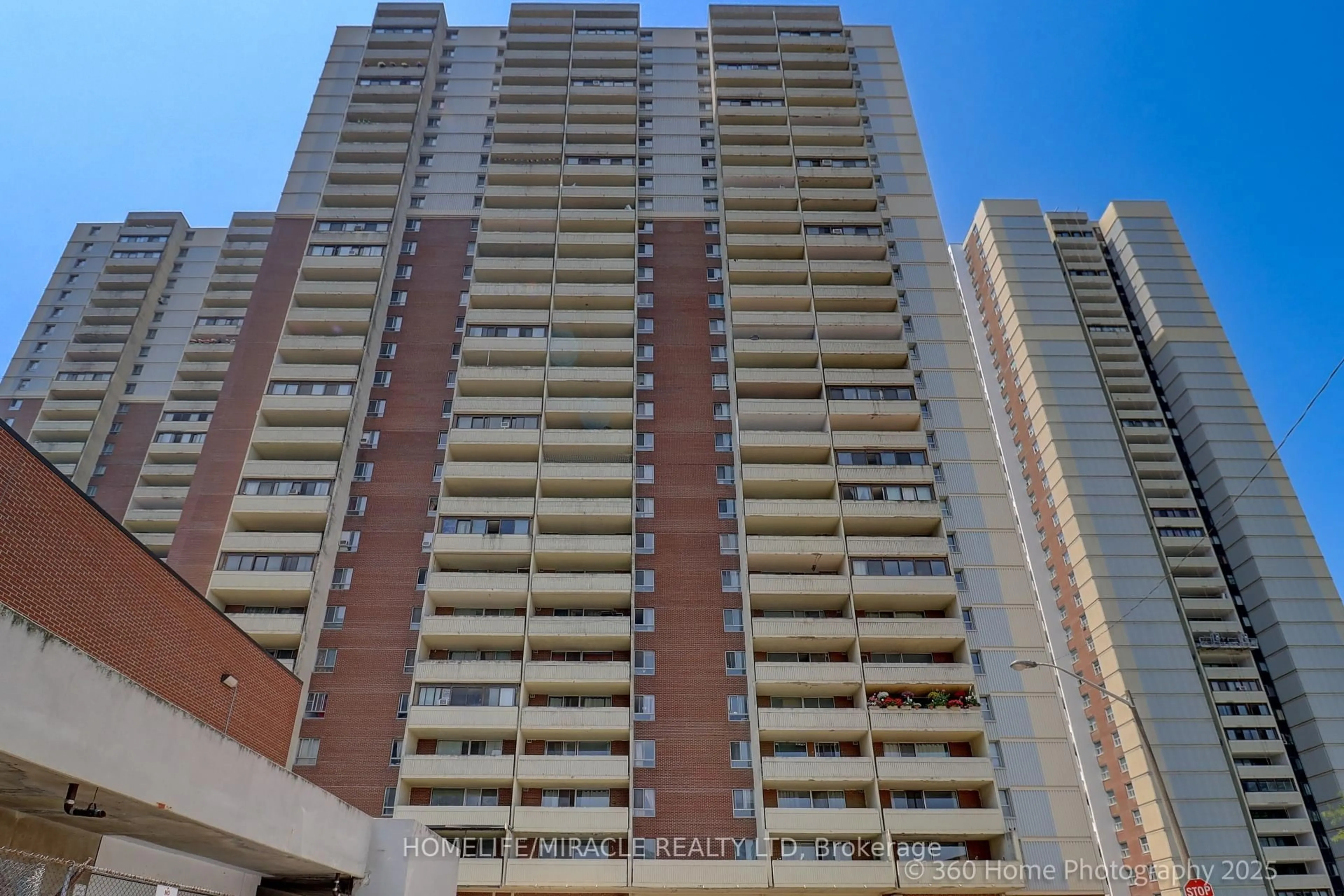 Balcony in the apartment, city buildings view from balcony for 5 Massey Sq #1819, Toronto Ontario M4C 5L6