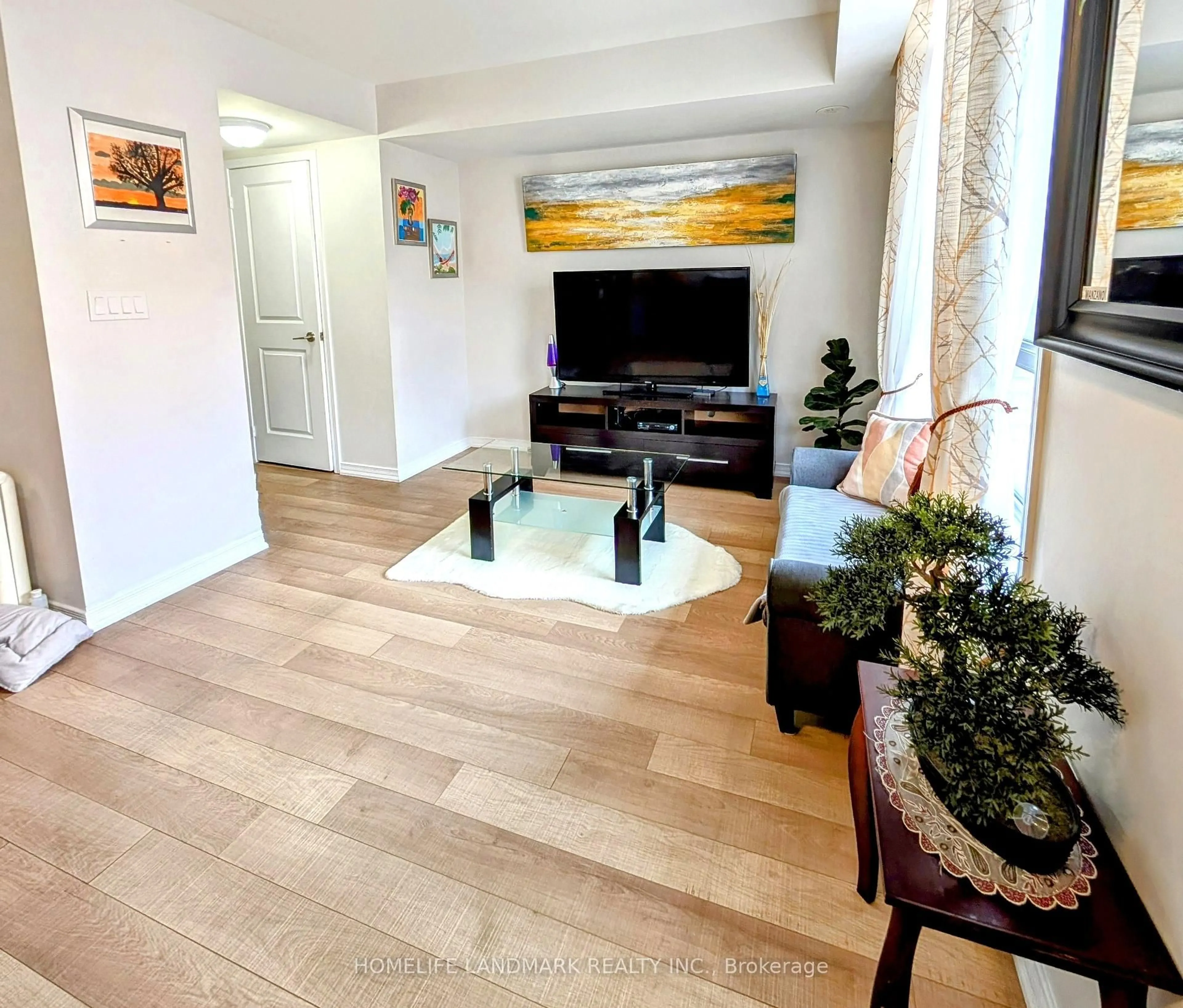Living room with furniture, unknown for 80 Orchid Place Dr #312, Toronto Ontario M1B 0C4
