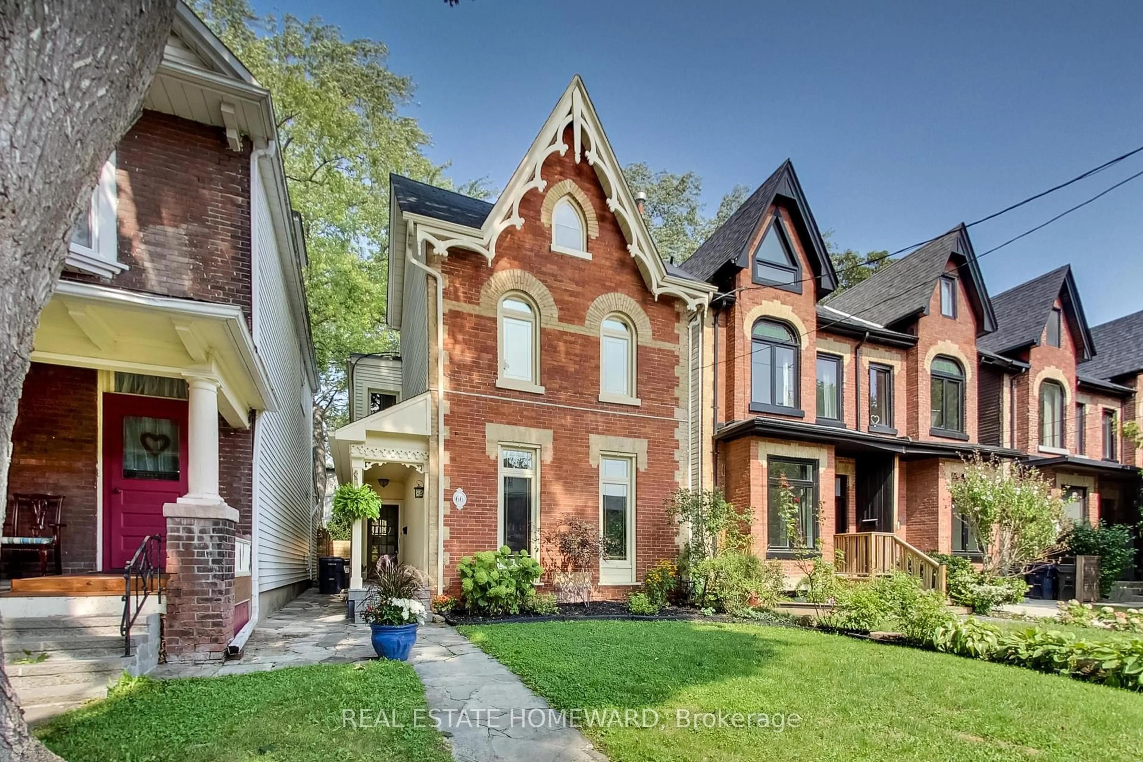 Home with brick exterior material, street for 66 Badgerow Ave, Toronto Ontario M4M 1V4