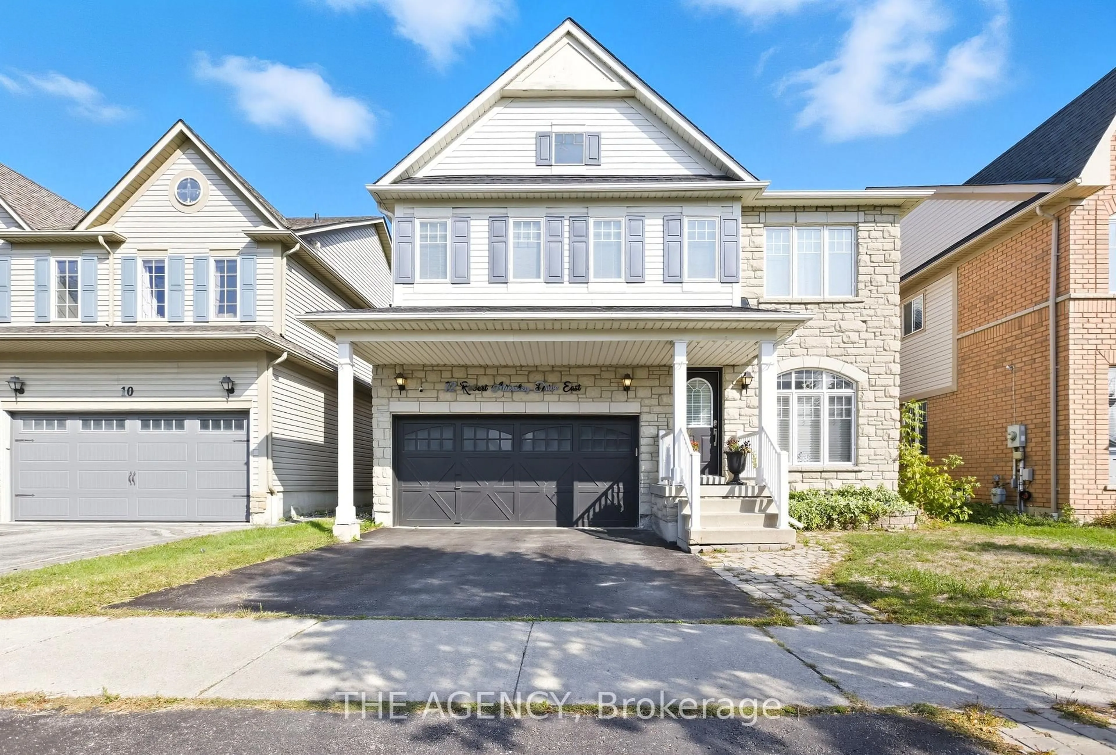 Home with brick exterior material, street for 12 Robert Attersley Dr, Whitby Ontario L1R 3E3