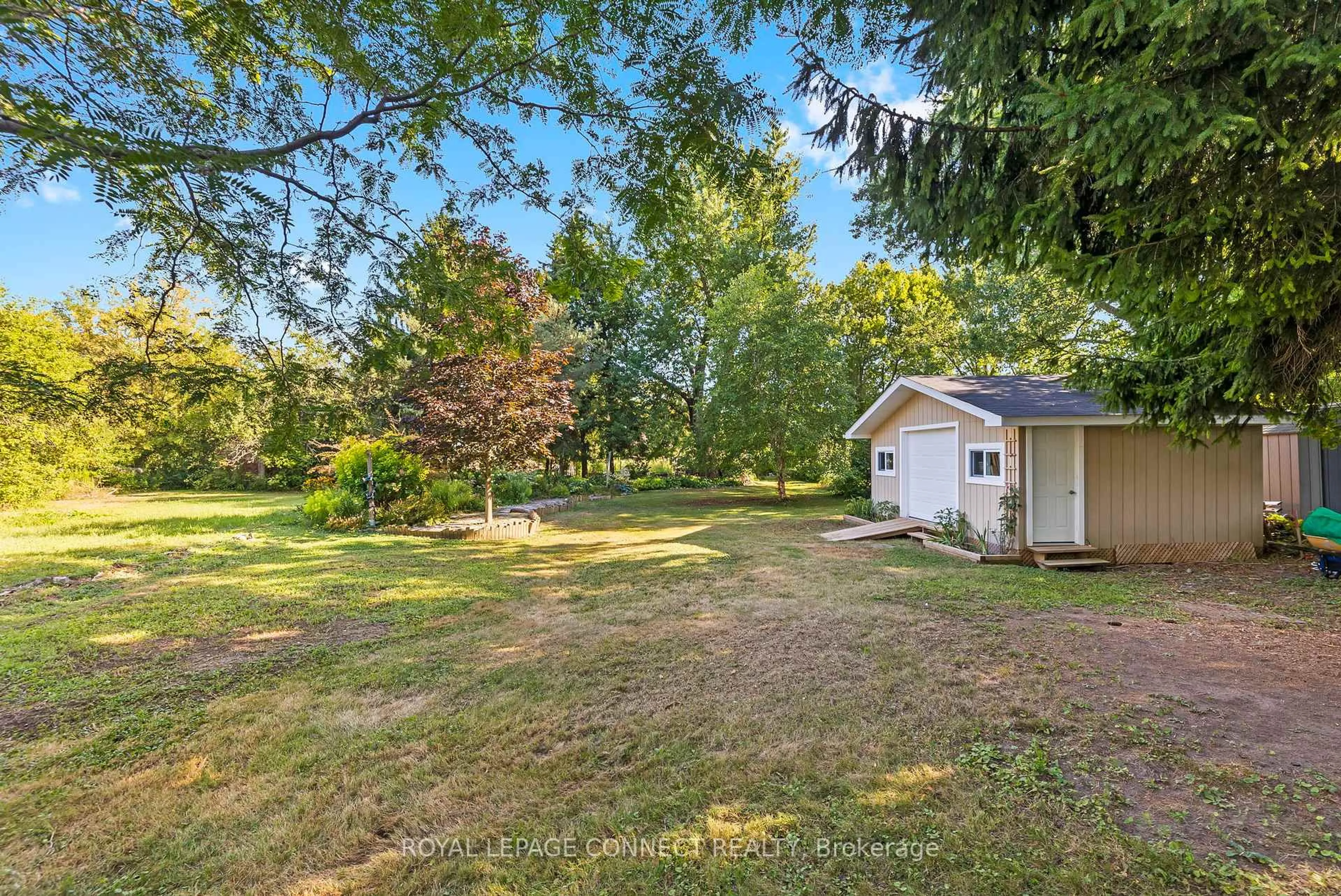 A pic from outside/outdoor area/front of a property/back of a property/a pic from drone, forest/trees view for 35 Lawson Rd, Clarington Ontario L1E 2K3