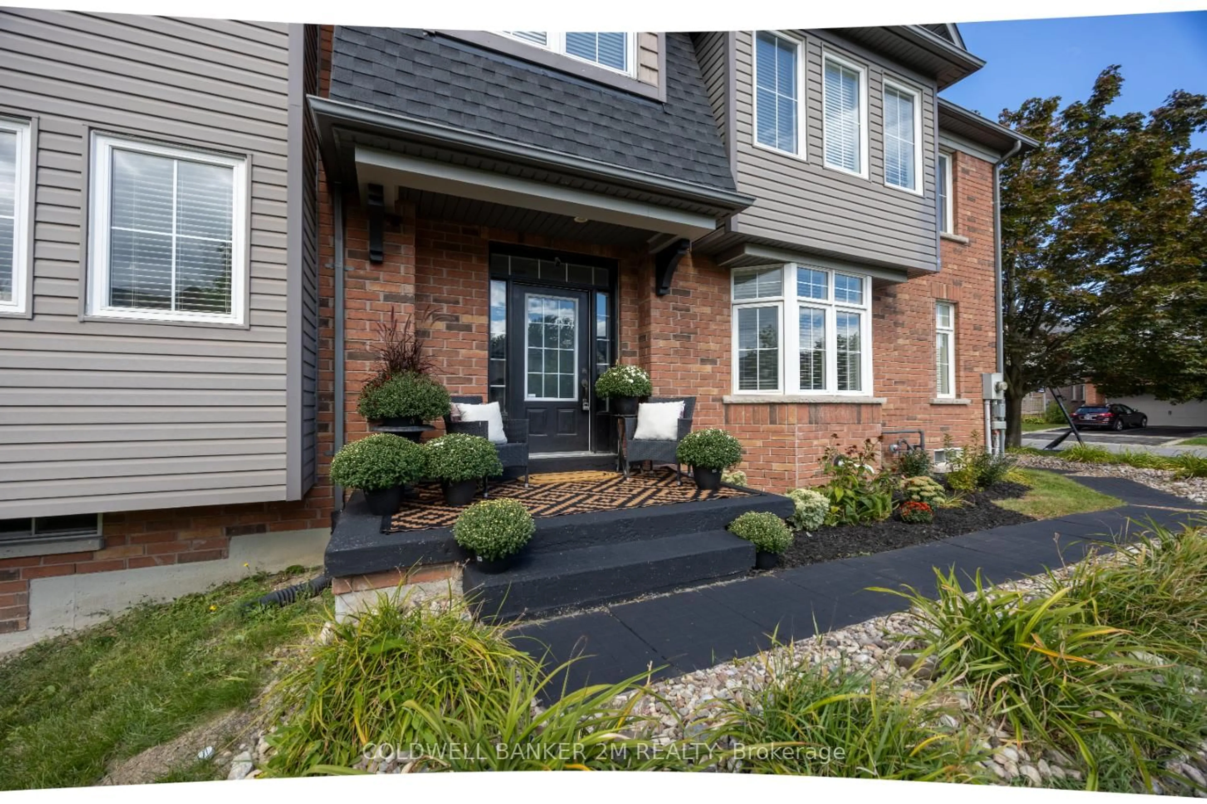Home with brick exterior material, street for 2 Woodbine Pl, Oshawa Ontario L1L 1C5