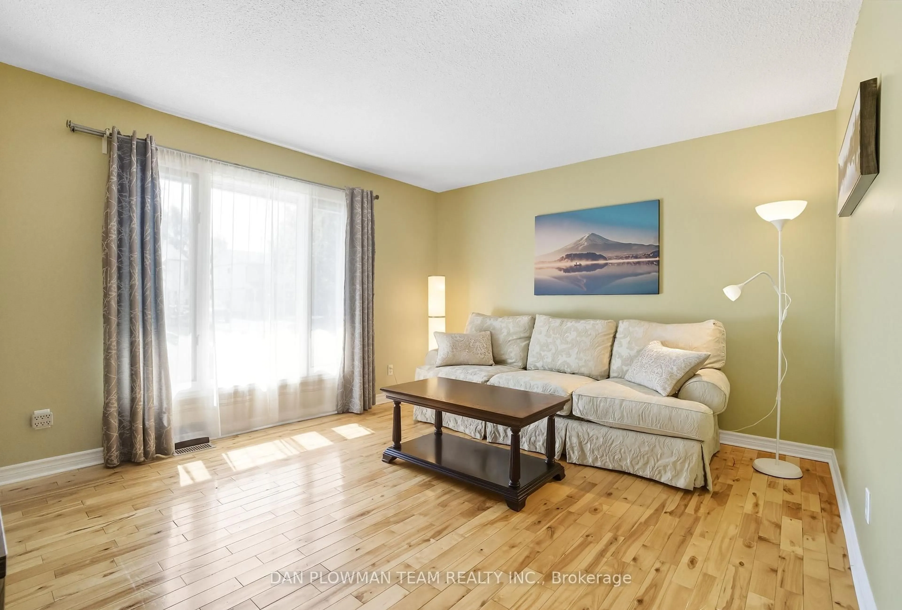 Living room with furniture, wood/laminate floor for 296 Phillip Murray Ave, Oshawa Ontario L1J 6N8
