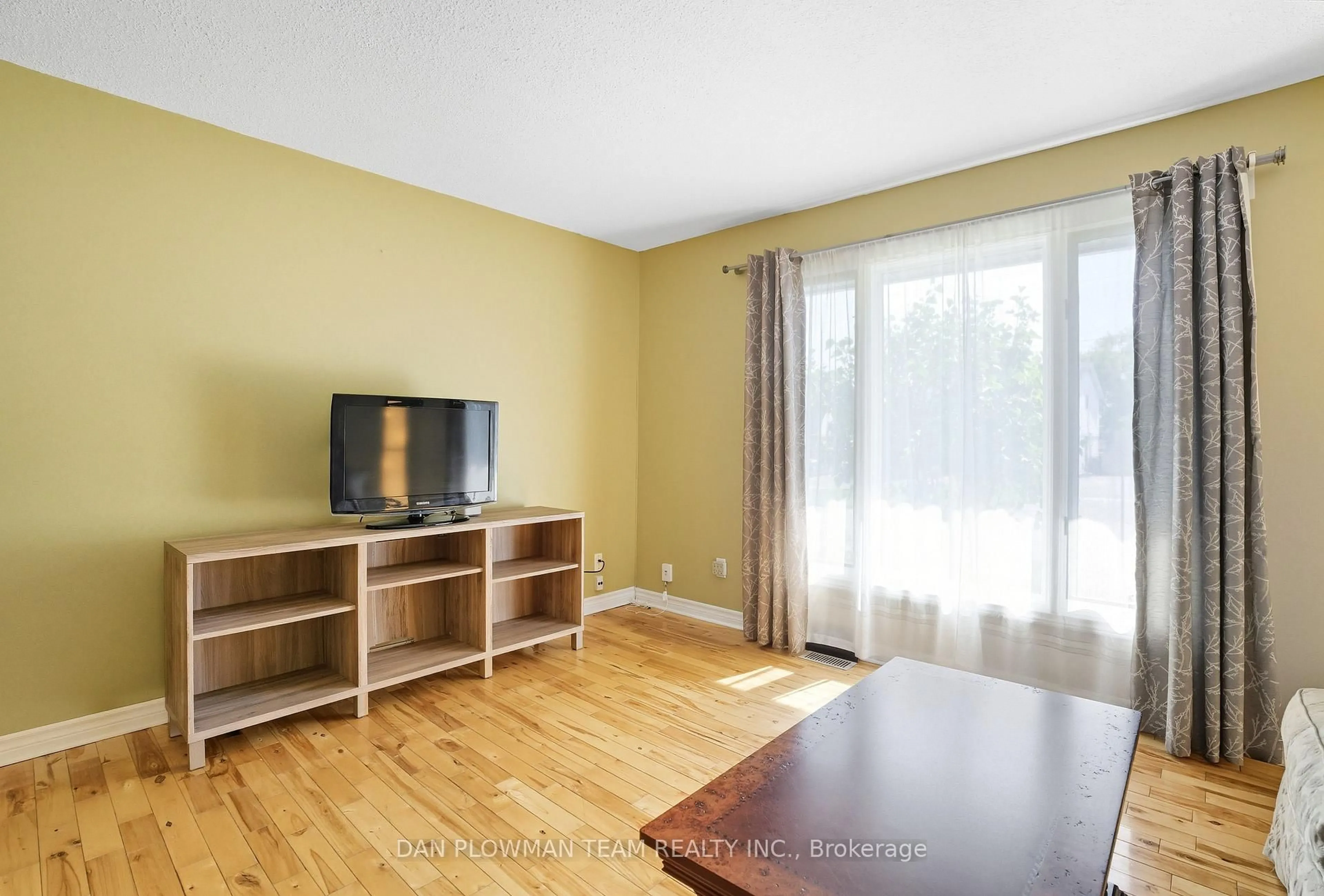 Living room with furniture, wood/laminate floor for 296 Phillip Murray Ave, Oshawa Ontario L1J 6N8