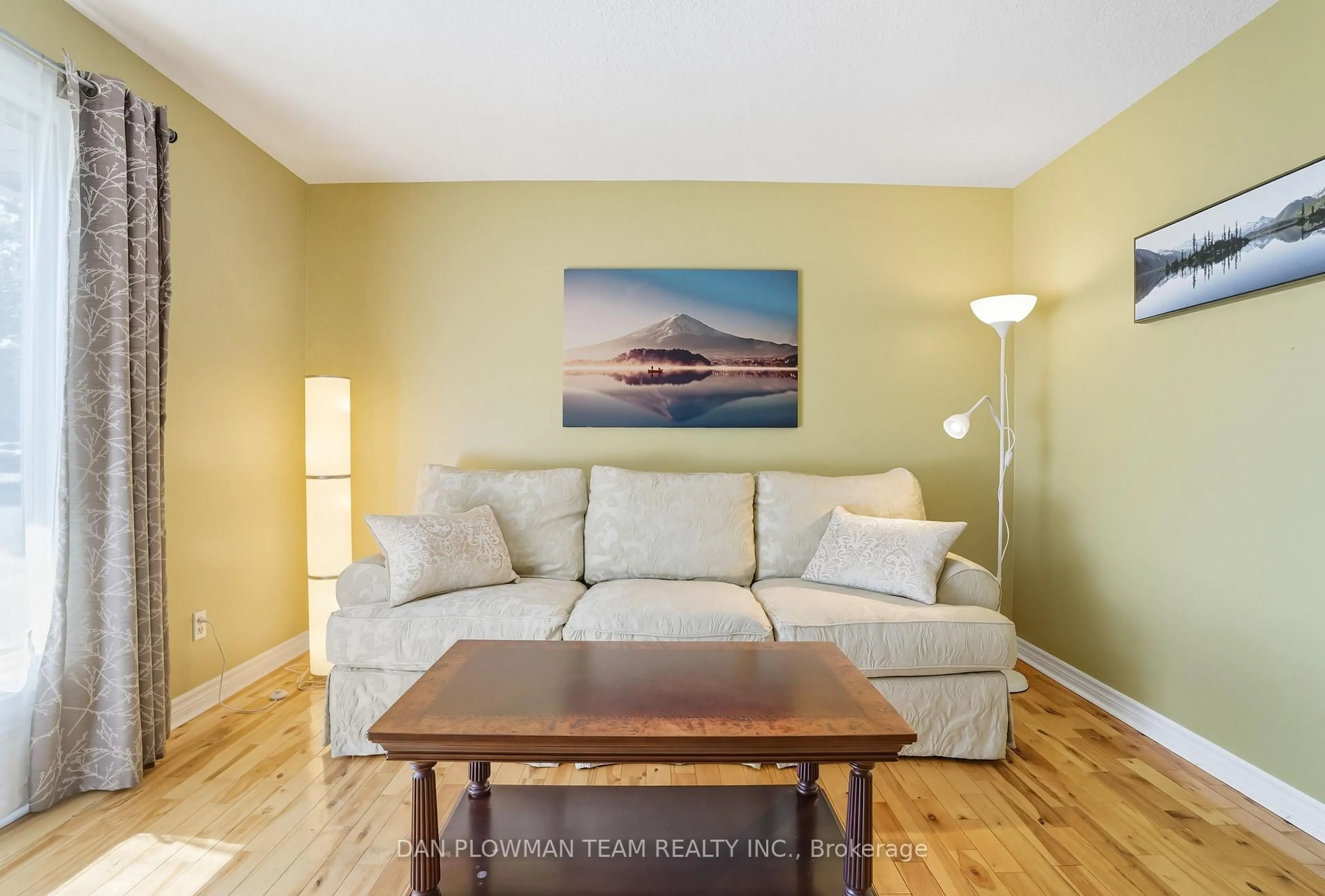 Living room with furniture, wood/laminate floor for 296 Phillip Murray Ave, Oshawa Ontario L1J 6N8