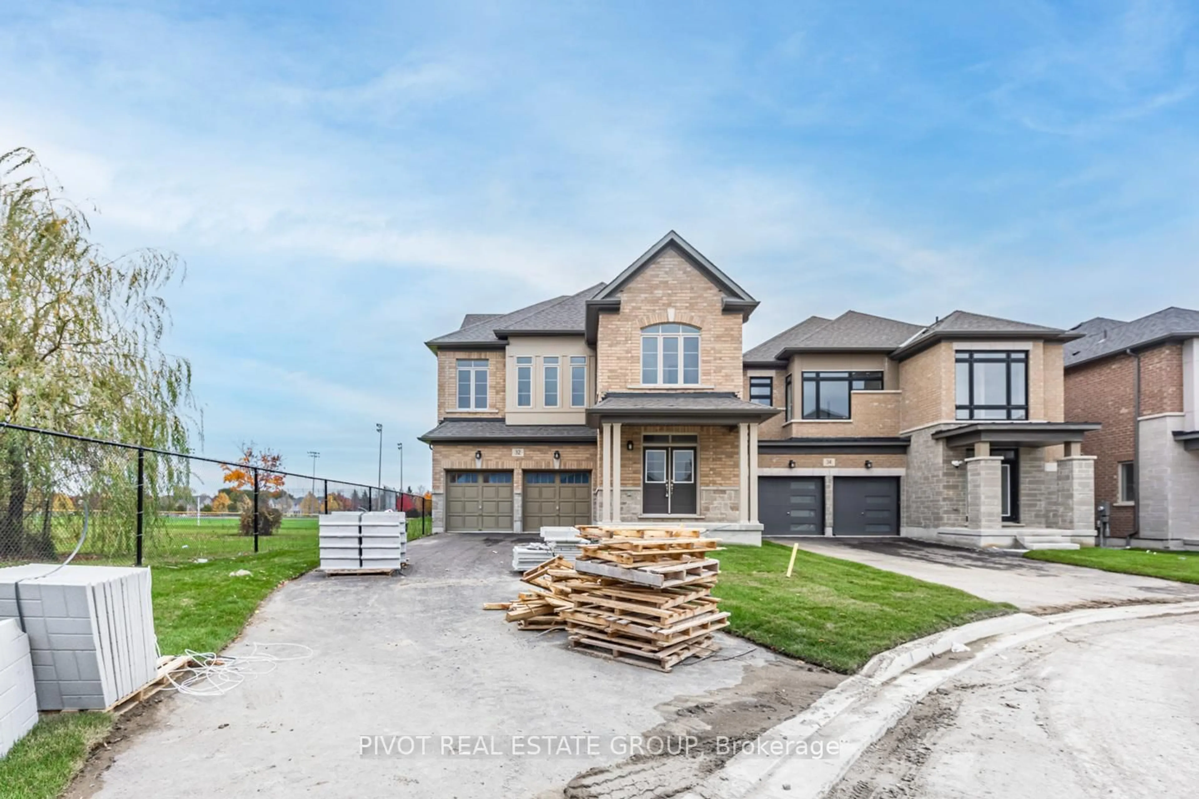 Home with brick exterior material, street for 32 Waterfront Cres, Whitby Ontario L1N 0M9