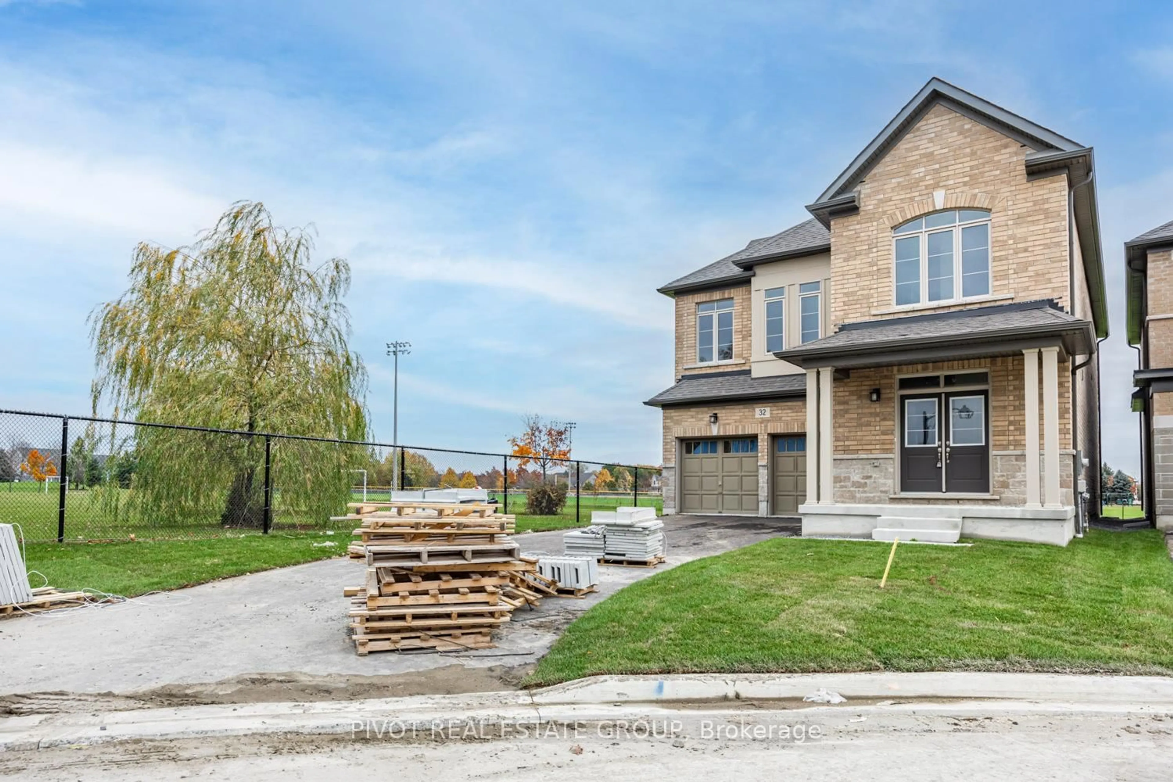 Home with brick exterior material, street for 32 Waterfront Cres, Whitby Ontario L1N 0M9