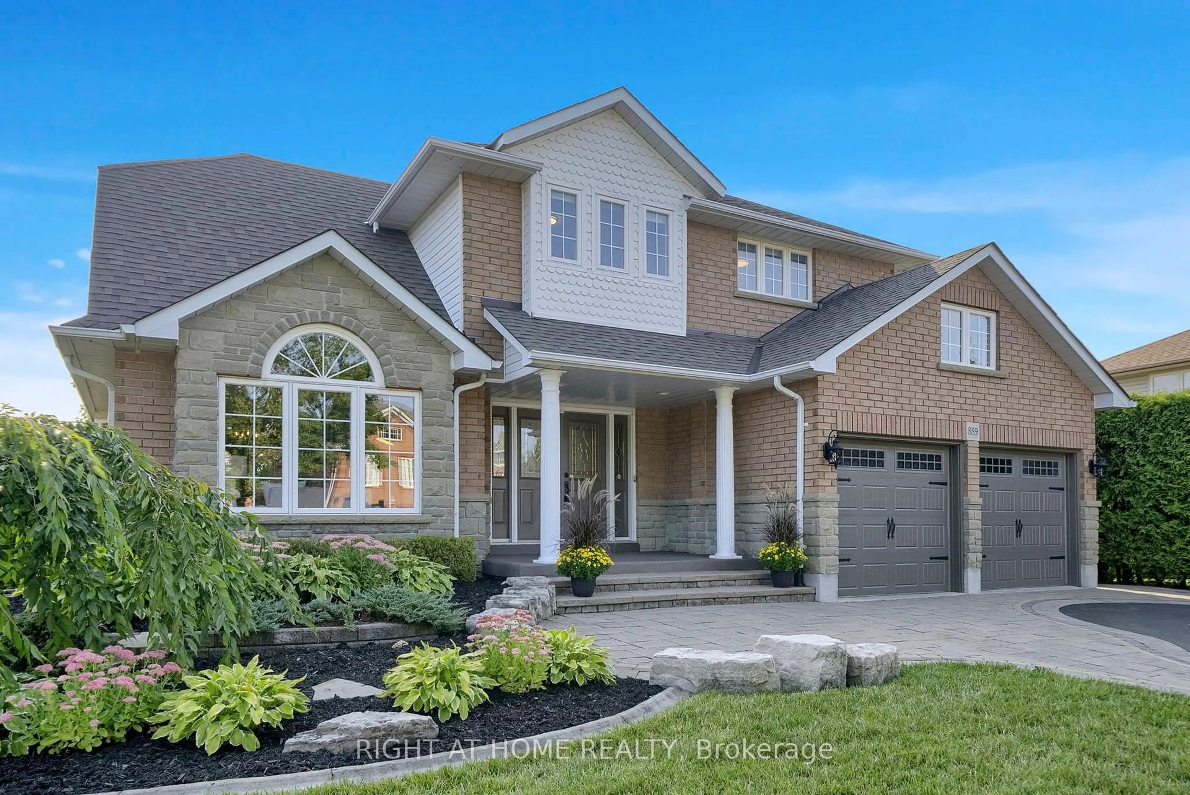 Home with brick exterior material, street for 889 Oberland Dr, Oshawa Ontario L1K 2M2