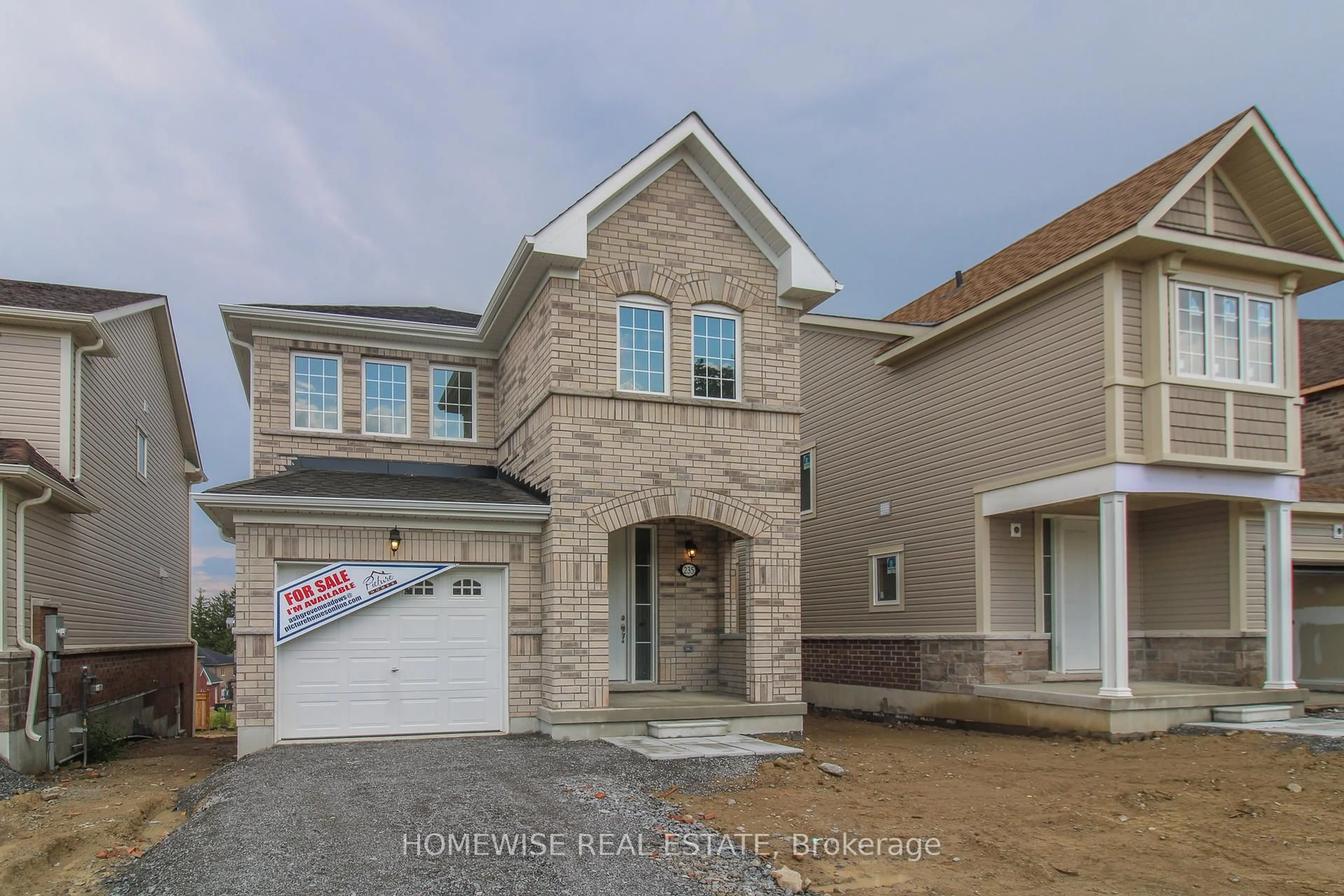 Home with brick exterior material, street for 235 Ash St, Scugog Ontario L9L 0B1