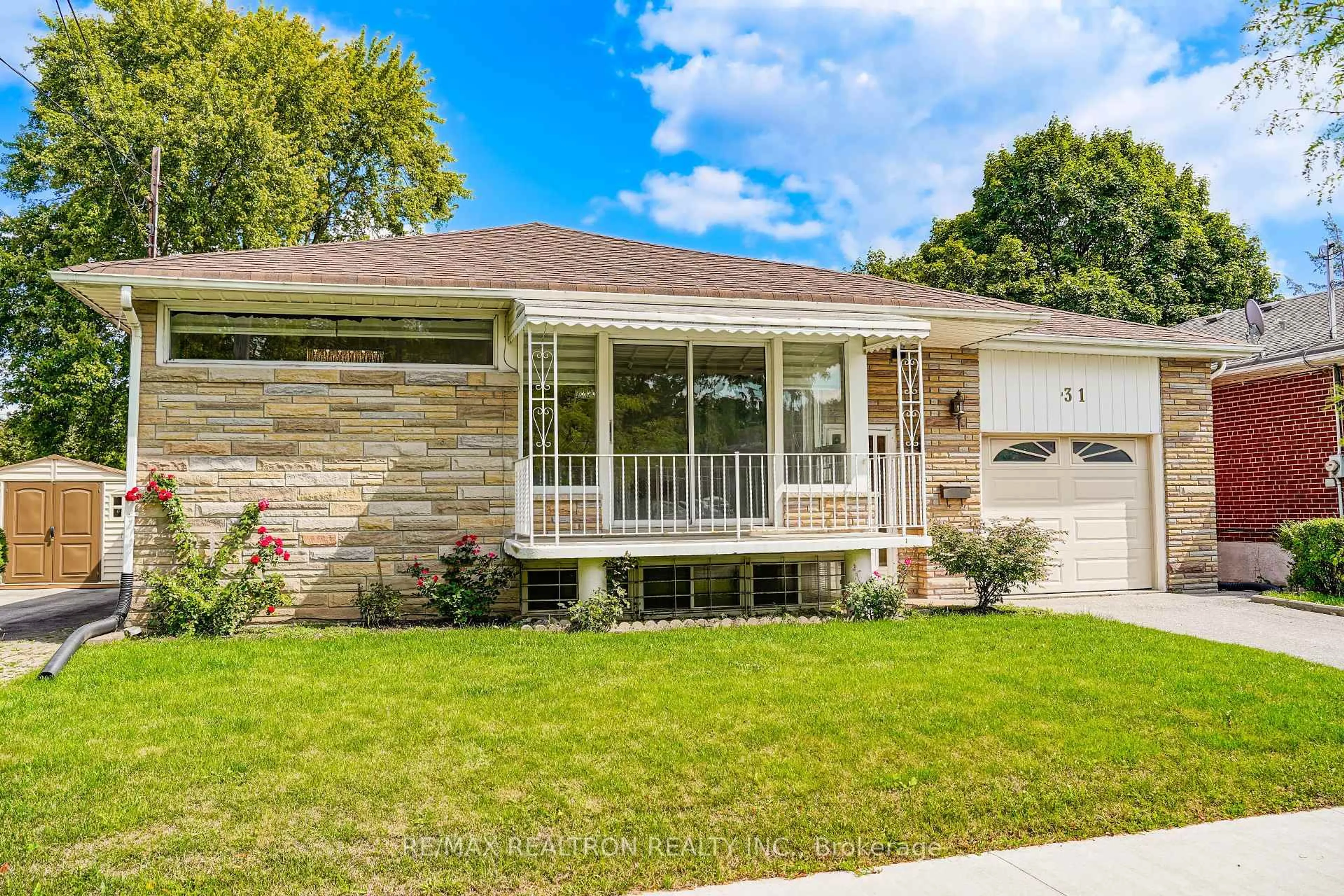 Home with brick exterior material, street for 31 Tedford Dr, Toronto Ontario M1R 1M2