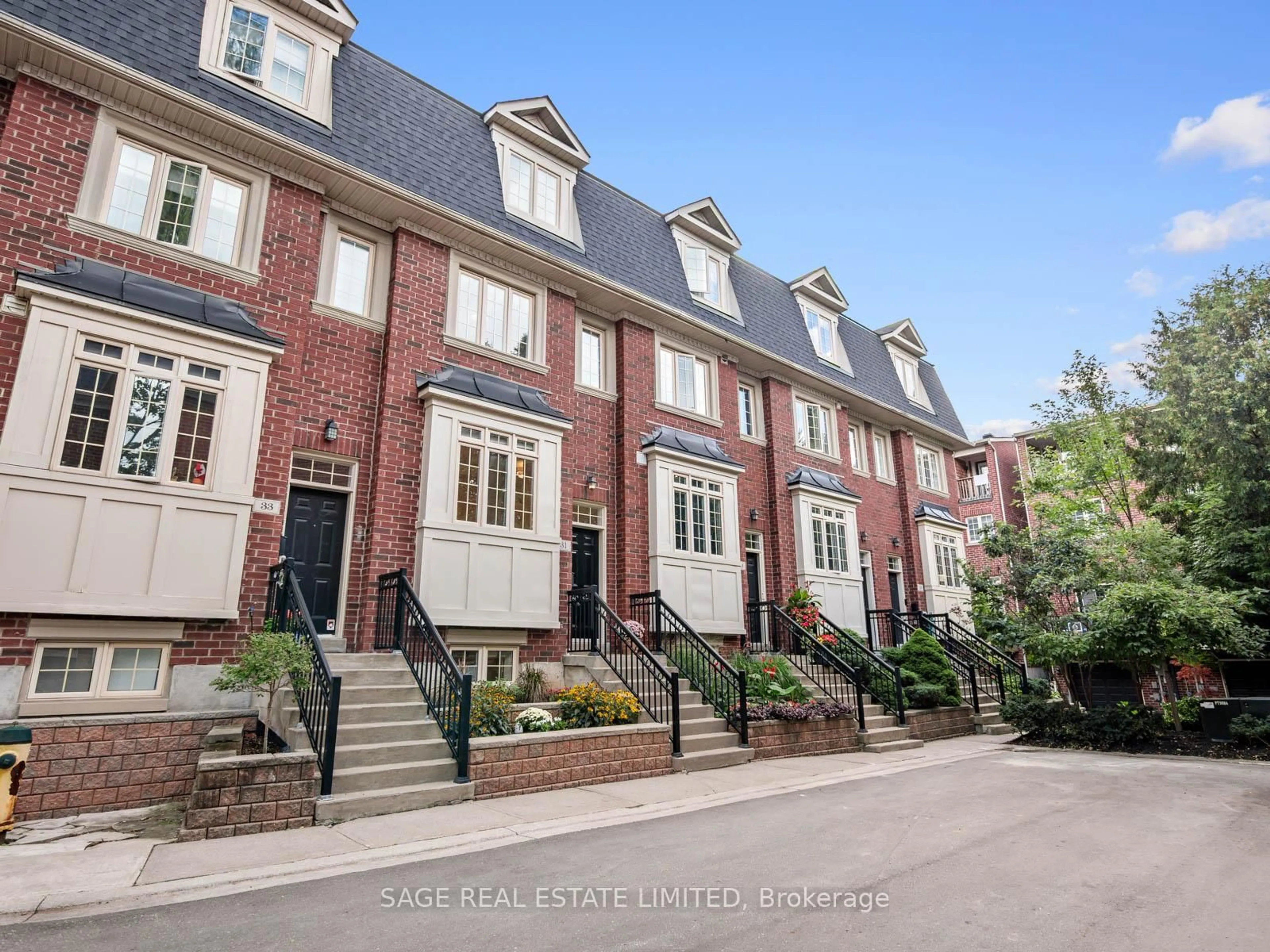 Home with brick exterior material, street for 31 Tompkins Mews, Toronto Ontario M4L 0A1