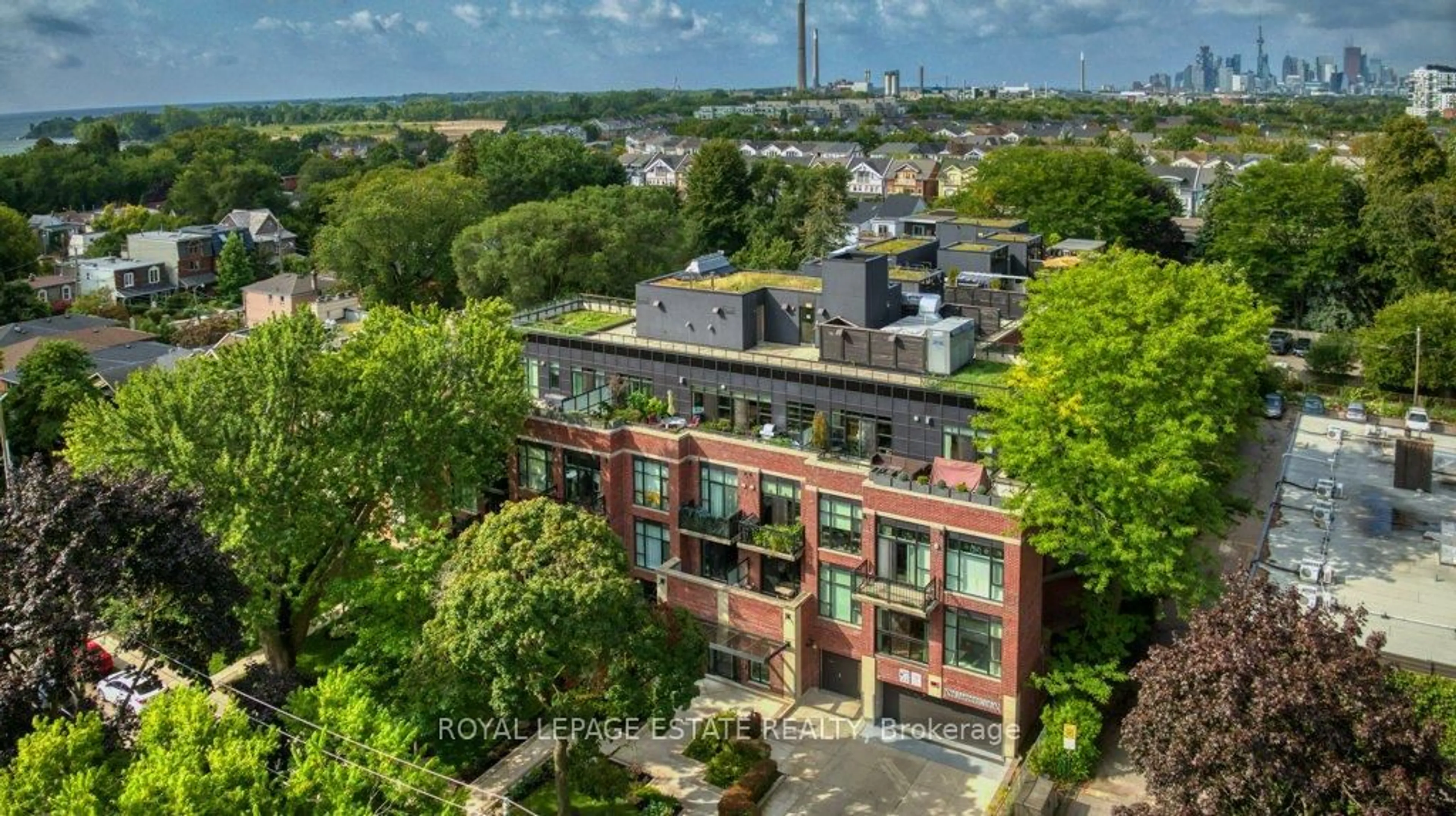 A pic from outside/outdoor area/front of a property/back of a property/a pic from drone, city buildings view from balcony for 66 Kippendavie Ave #408, Toronto Ontario M4L 0A4
