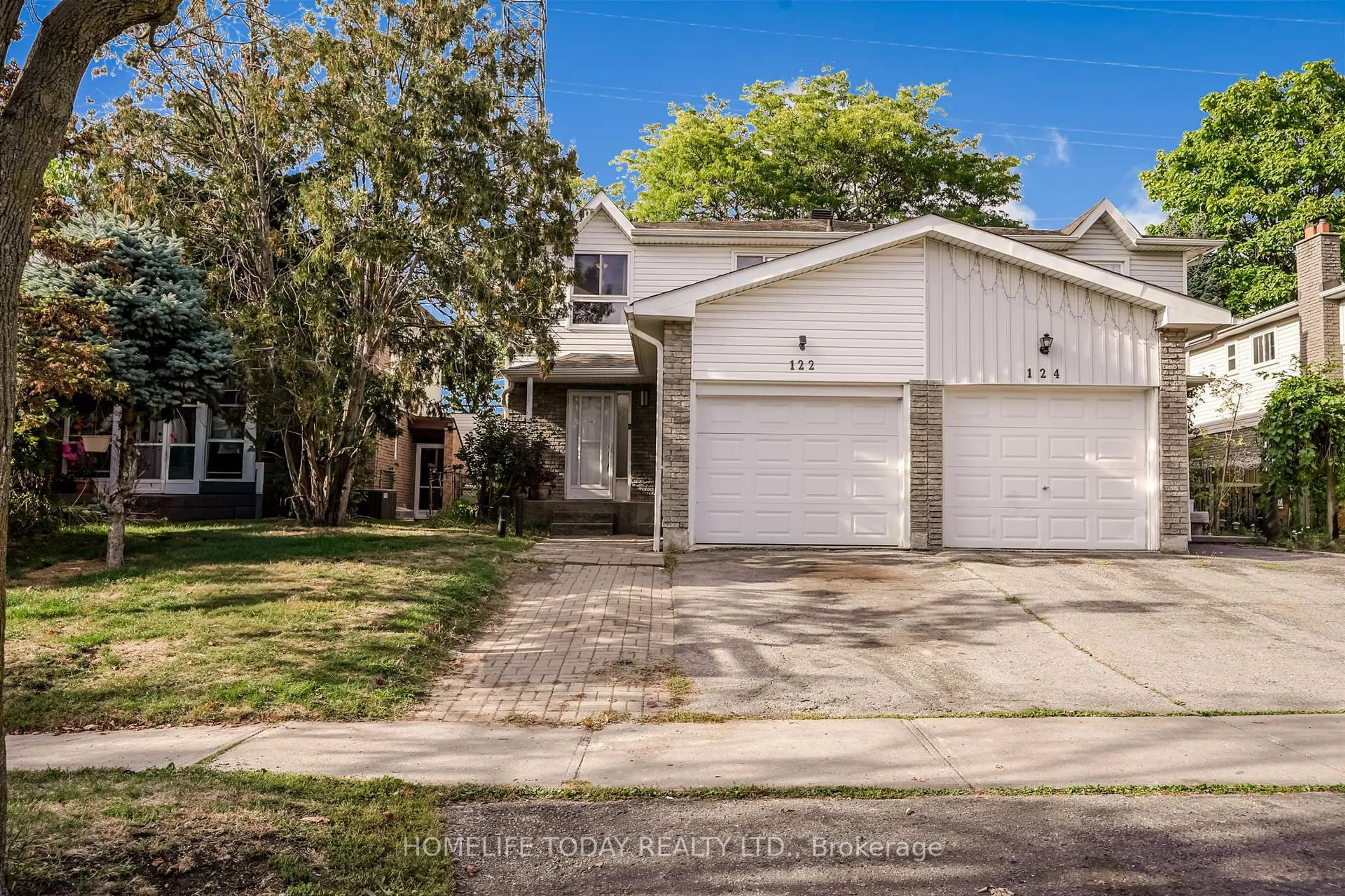 Home with vinyl exterior material, street for 122 Valdor Dr, Toronto Ontario M1V 1R5