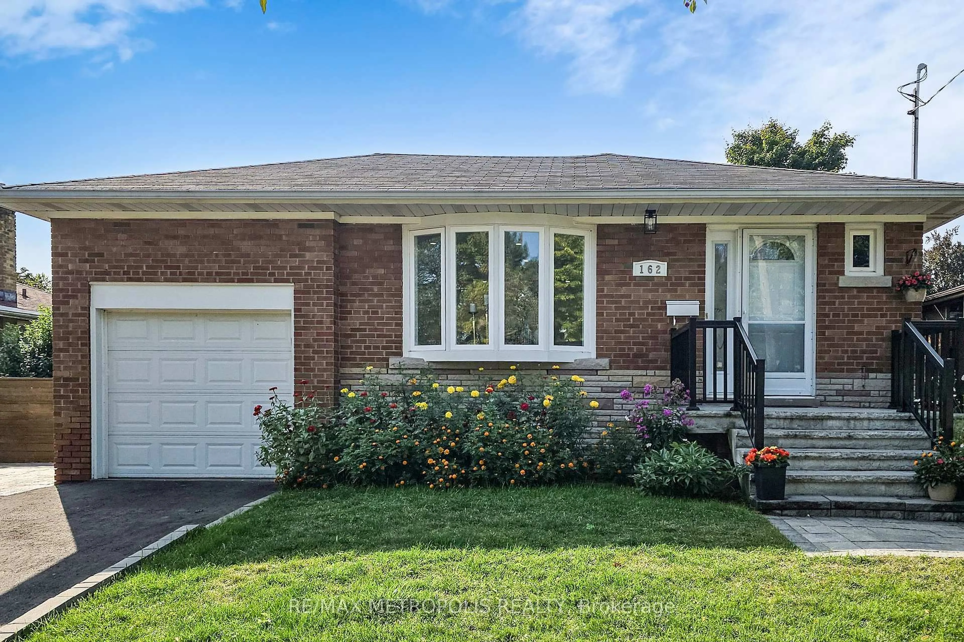 Home with brick exterior material, street for 162 Lord Roberts Dr, Toronto Ontario M1K 3W9