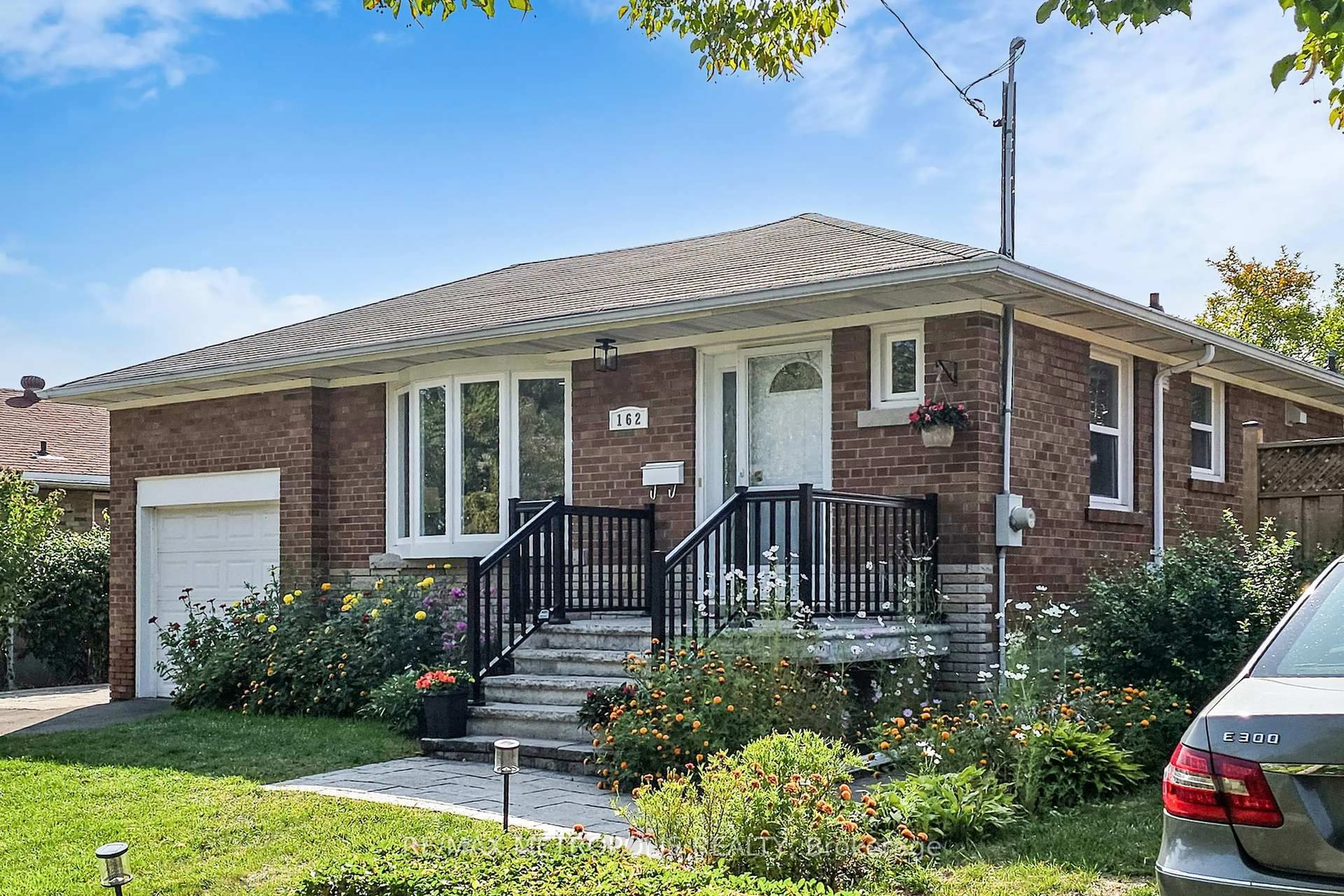 Home with brick exterior material, street for 162 Lord Roberts Dr, Toronto Ontario M1K 3W9