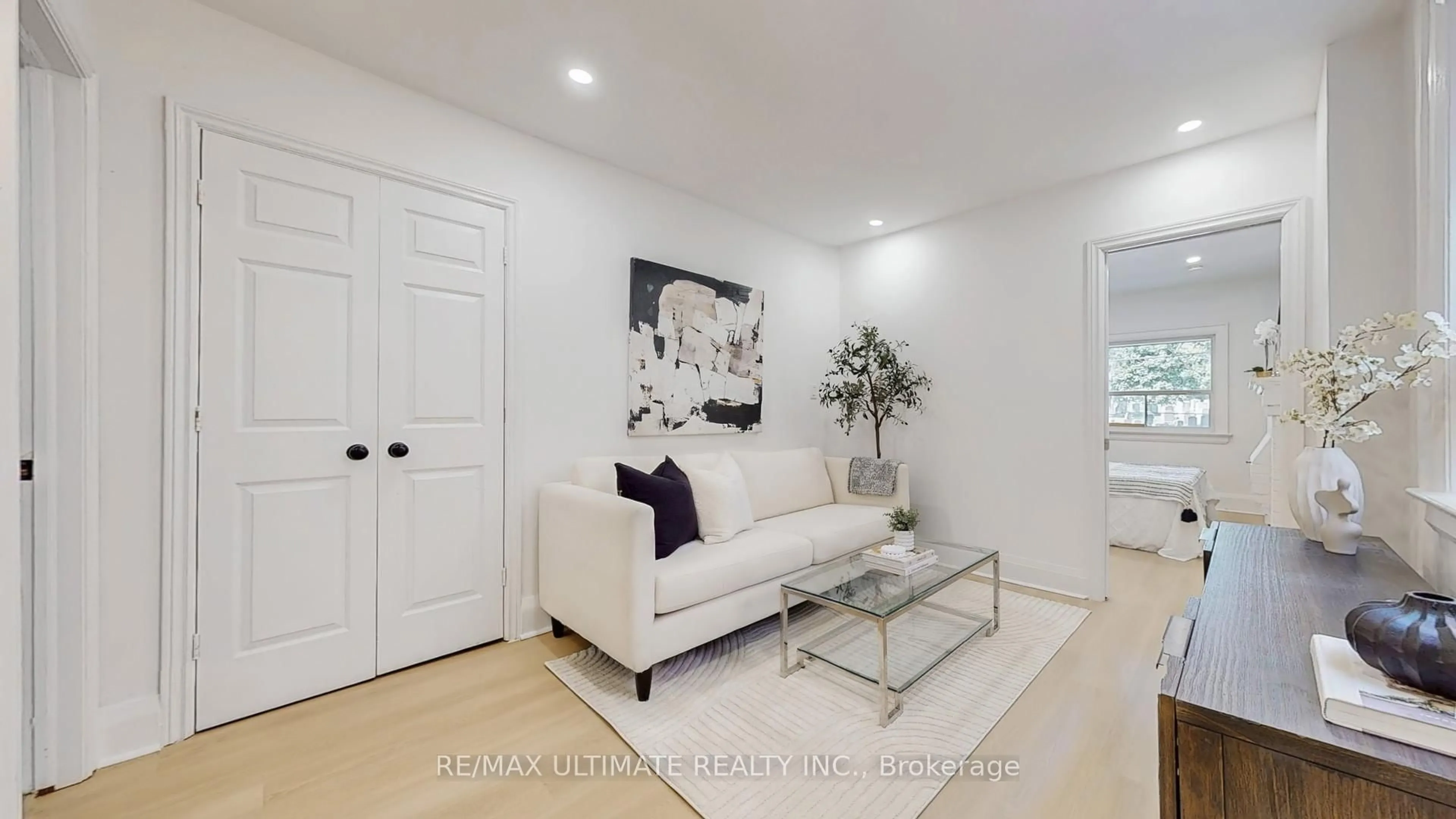 Living room with furniture, ceramic/tile floor for 217 Kingston Rd, Toronto Ontario M4L 1T5