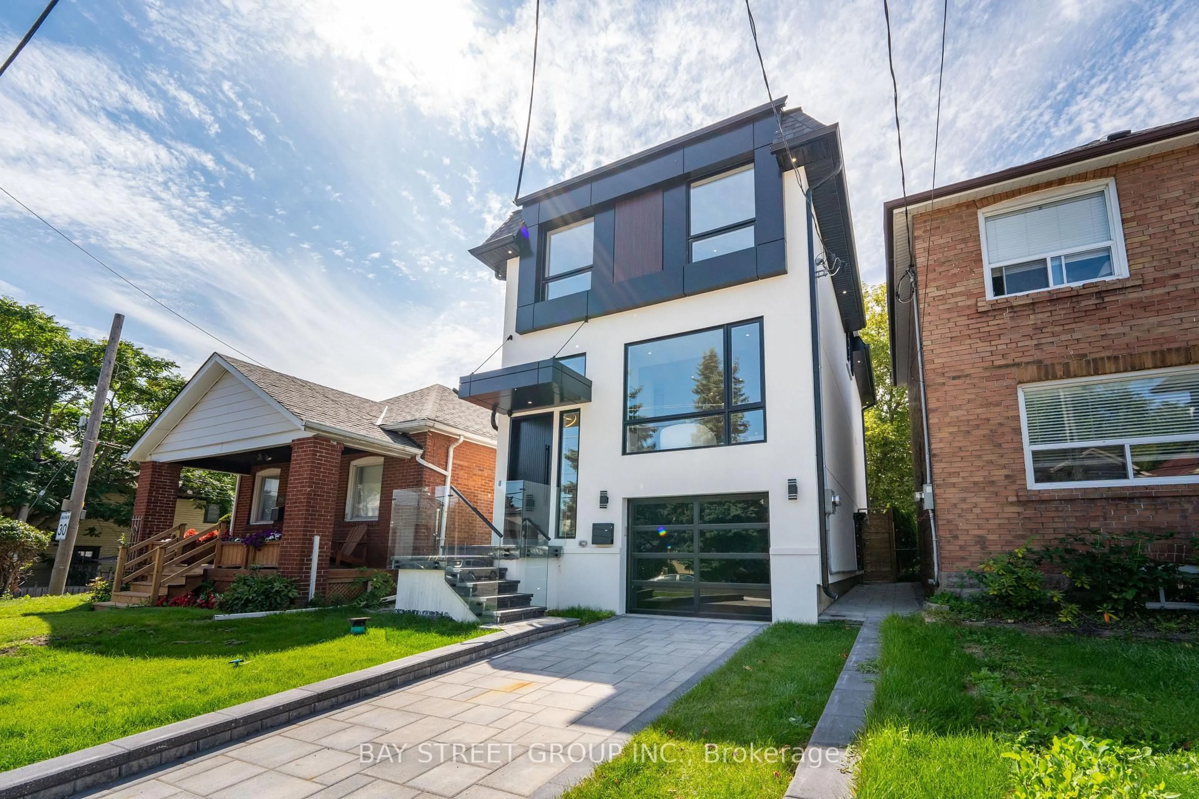 Home with brick exterior material, street for 266 Westlake Ave, Toronto Ontario M4C 4T6