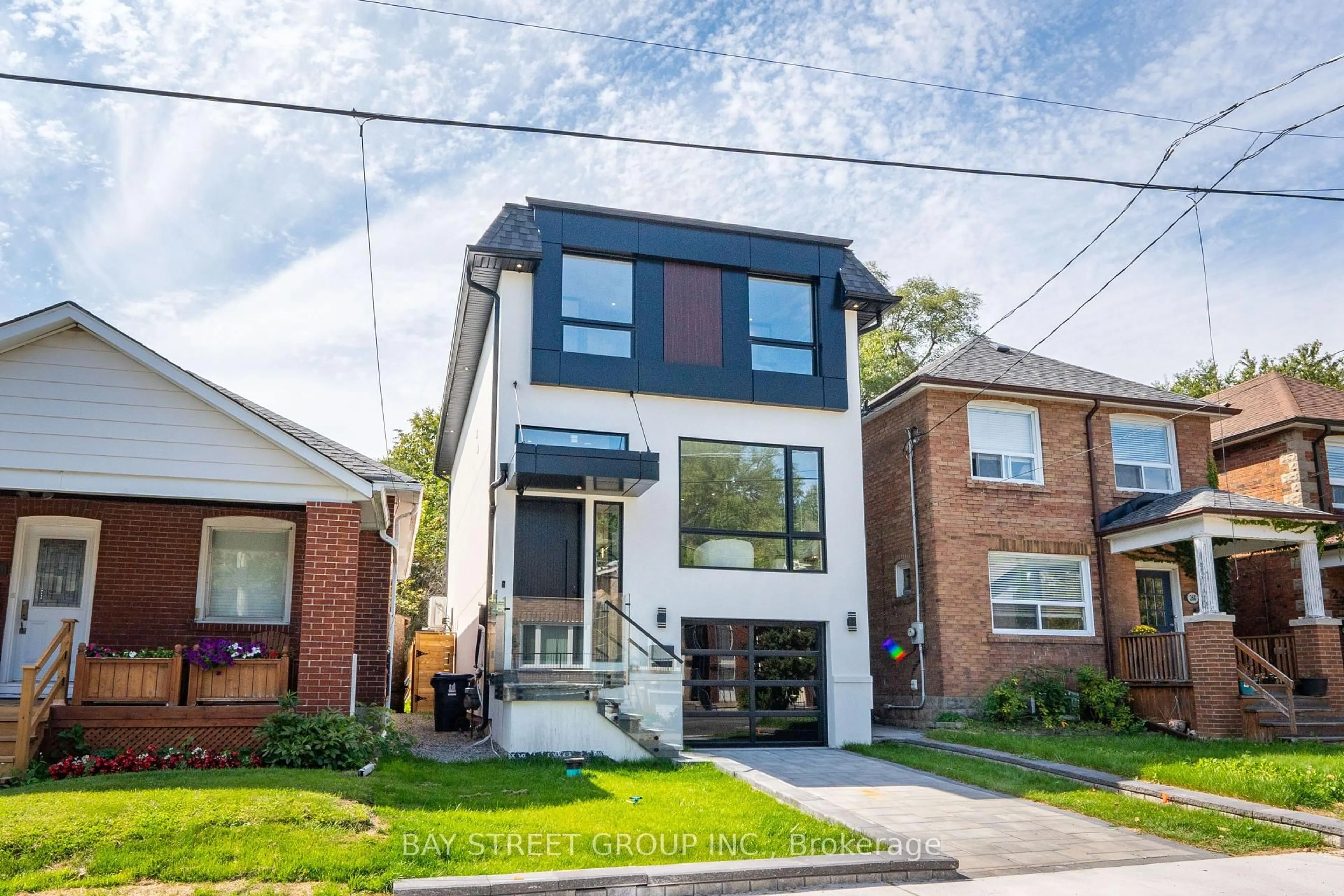 Home with brick exterior material, street for 266 Westlake Ave, Toronto Ontario M4C 4T6