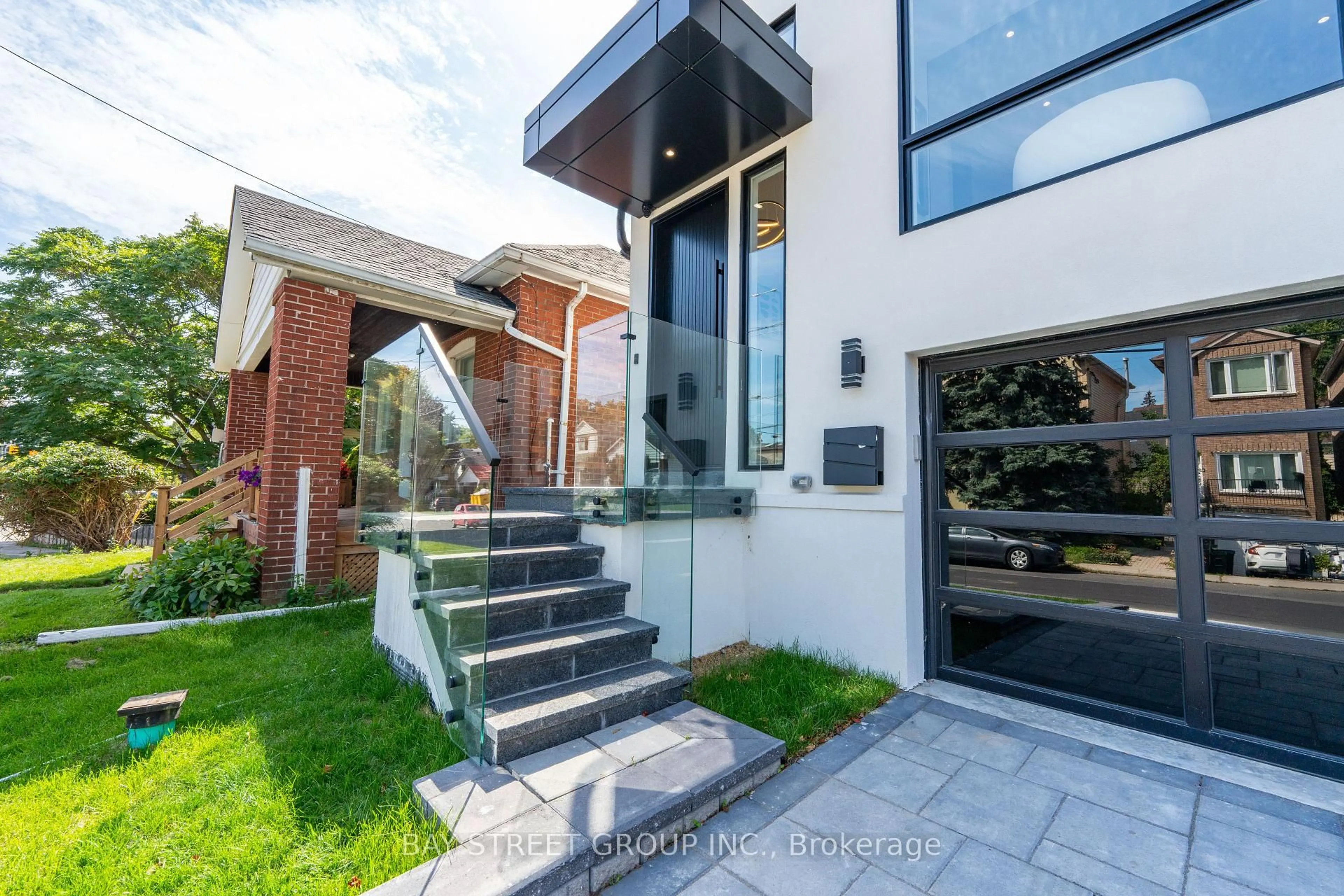 Home with brick exterior material, street for 266 Westlake Ave, Toronto Ontario M4C 4T6
