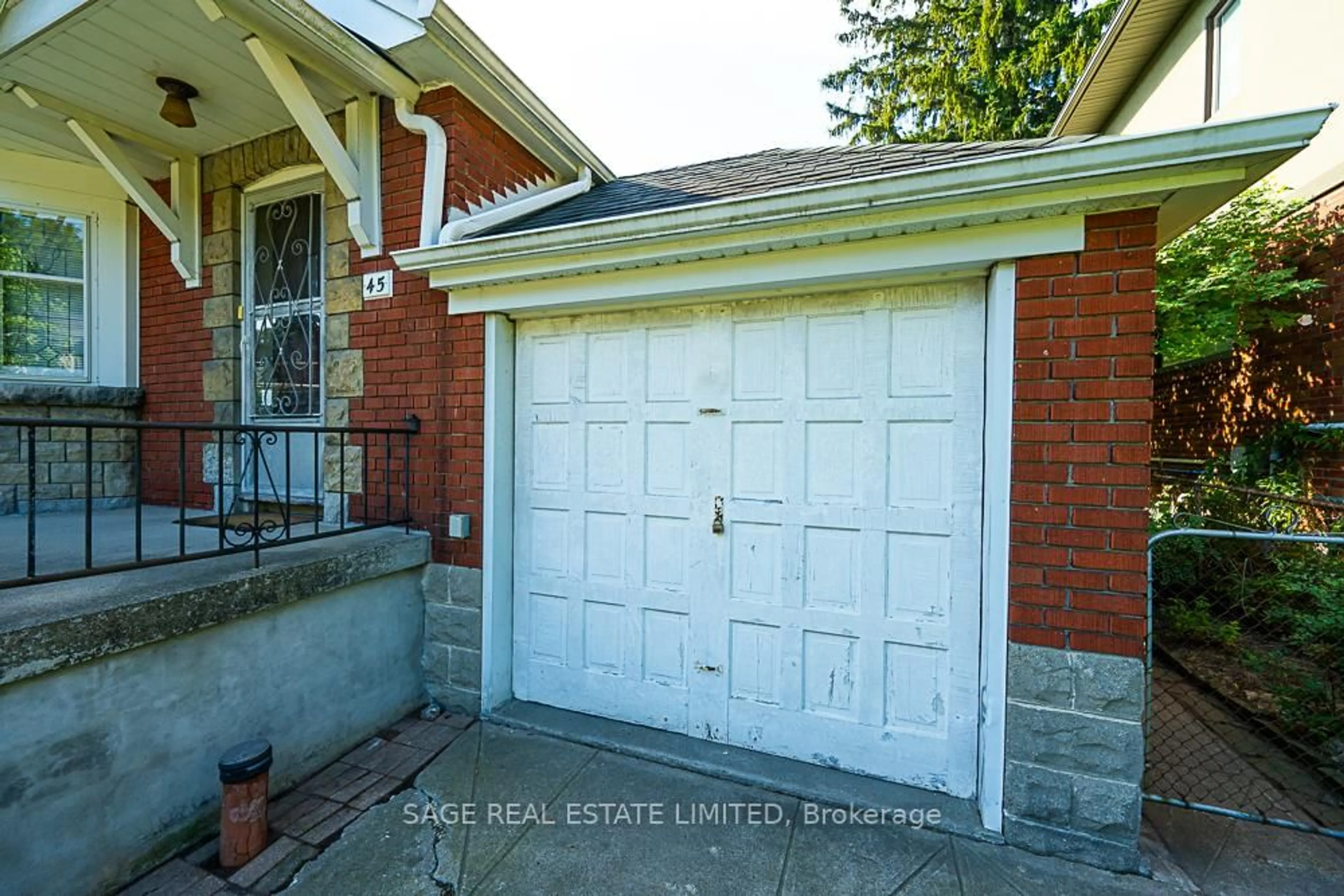Home with brick exterior material, street for 45 Four Oaks Gate, Toronto Ontario M4J 2X3