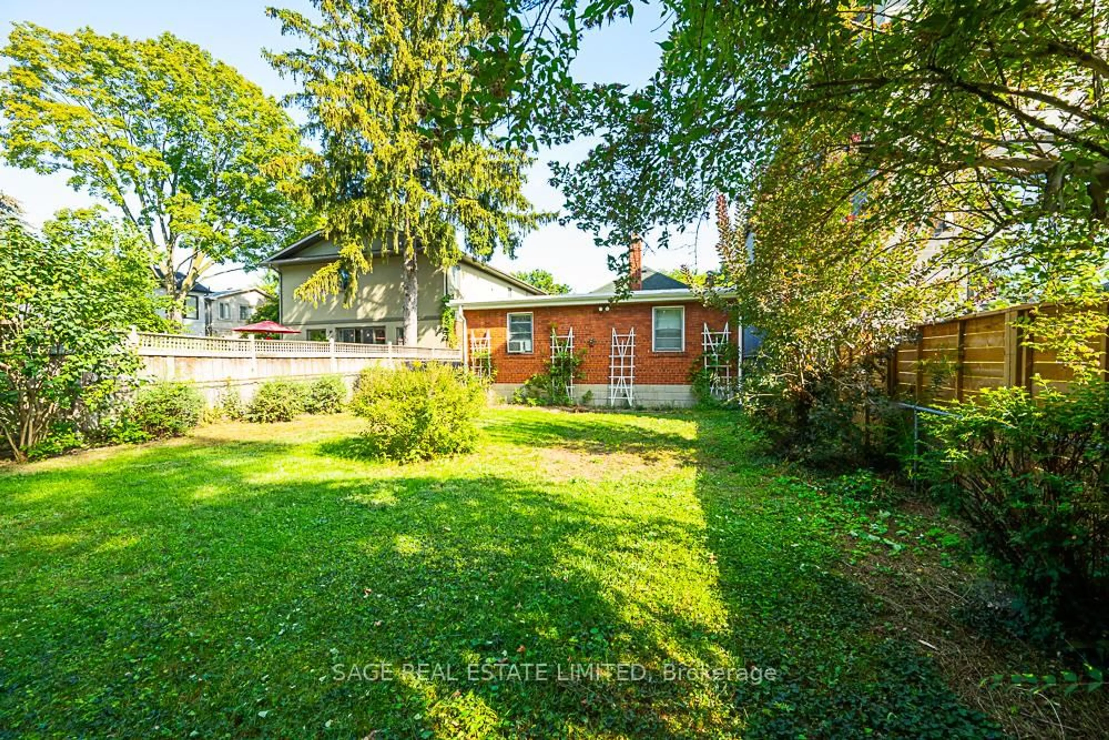 A pic from outside/outdoor area/front of a property/back of a property/a pic from drone, unknown for 45 Four Oaks Gate, Toronto Ontario M4J 2X3