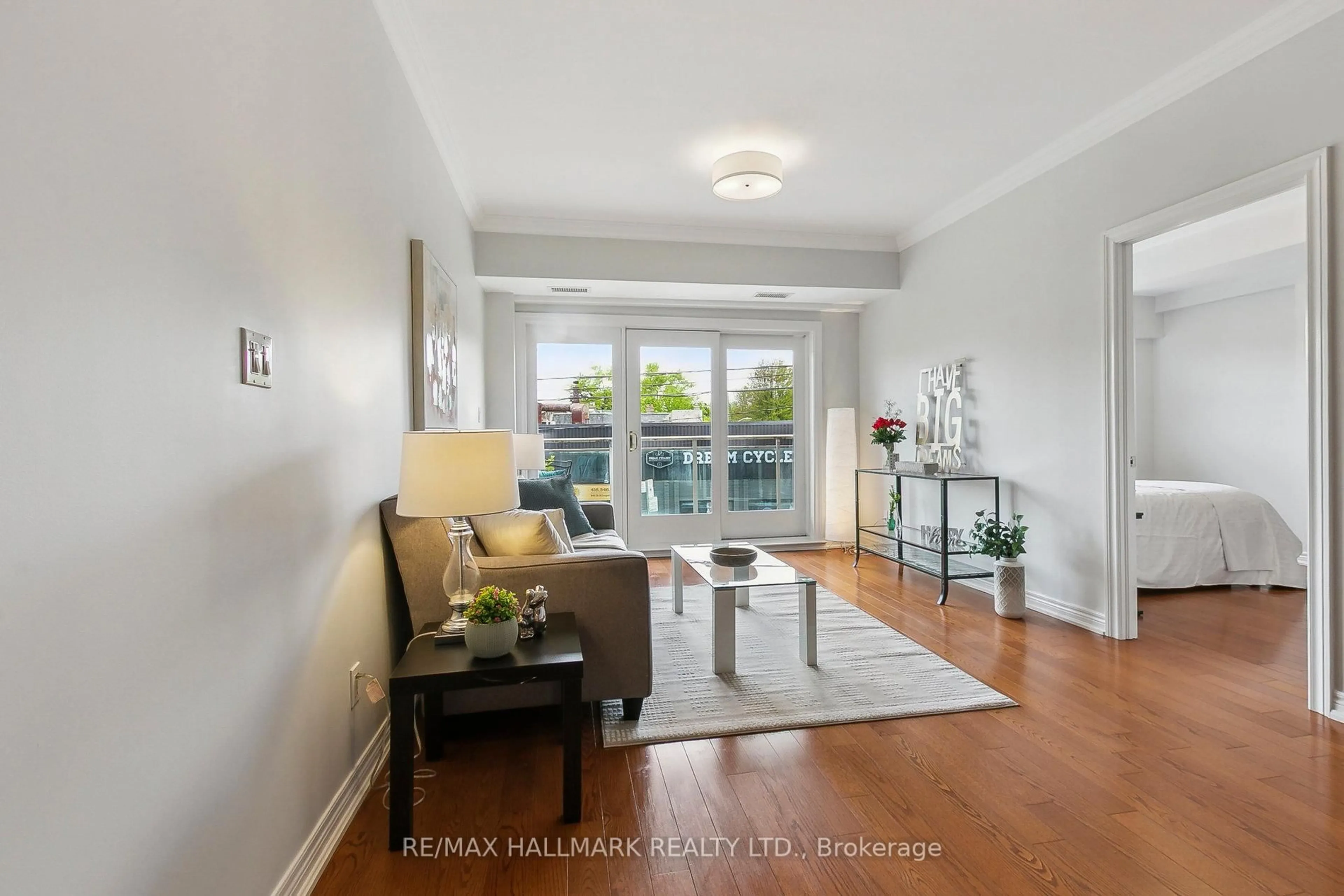 Living room with furniture, unknown for 1 Lawlor Ave #206, Toronto Ontario M4E 3L8