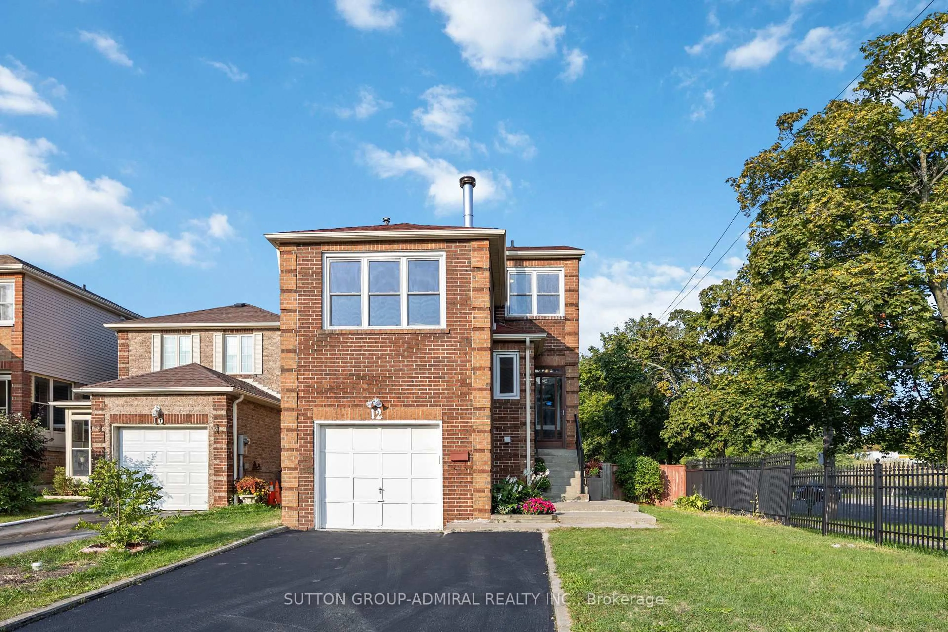 Home with brick exterior material, street for 12 Tilburn Pl, Toronto Ontario M1N 4B6