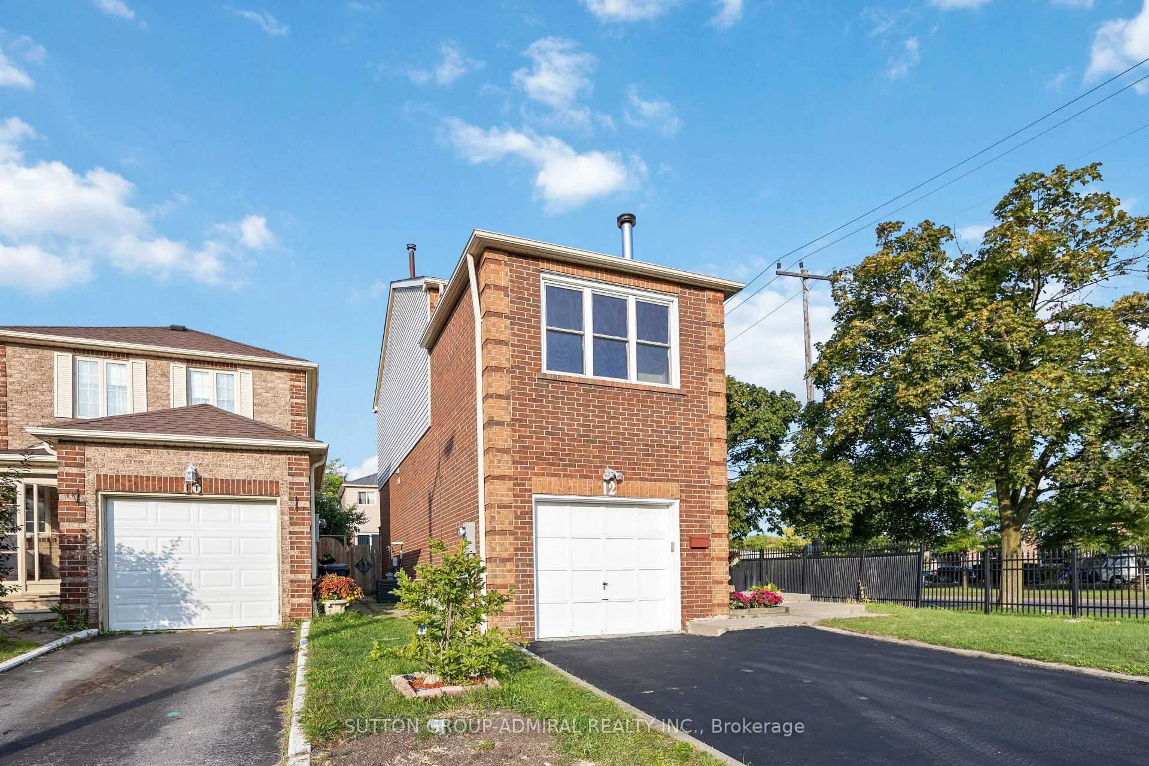 Home with brick exterior material, street for 12 Tilburn Pl, Toronto Ontario M1N 4B6
