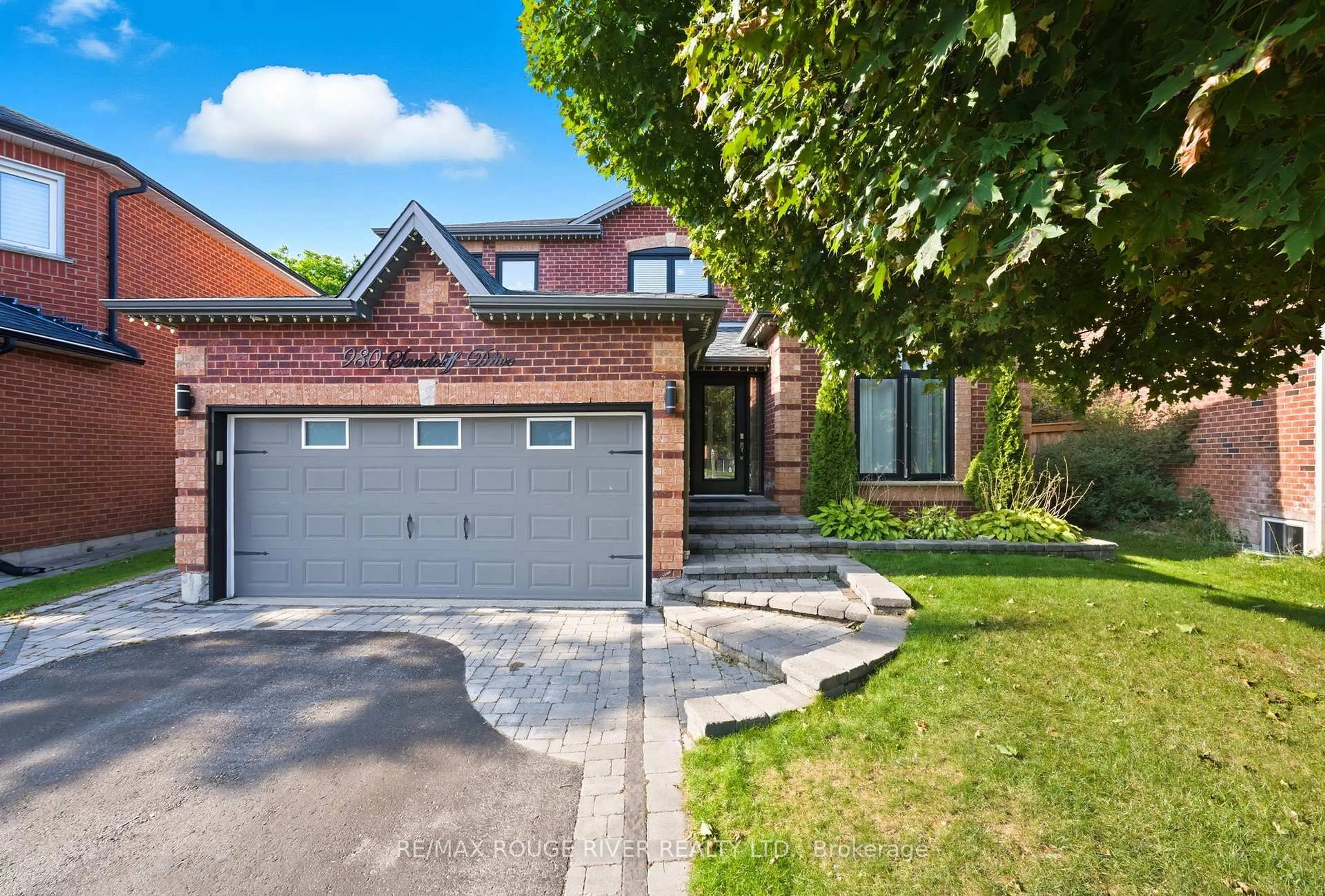 Home with brick exterior material, street for 980 Sandcliff Dr, Oshawa Ontario L1K 2E4