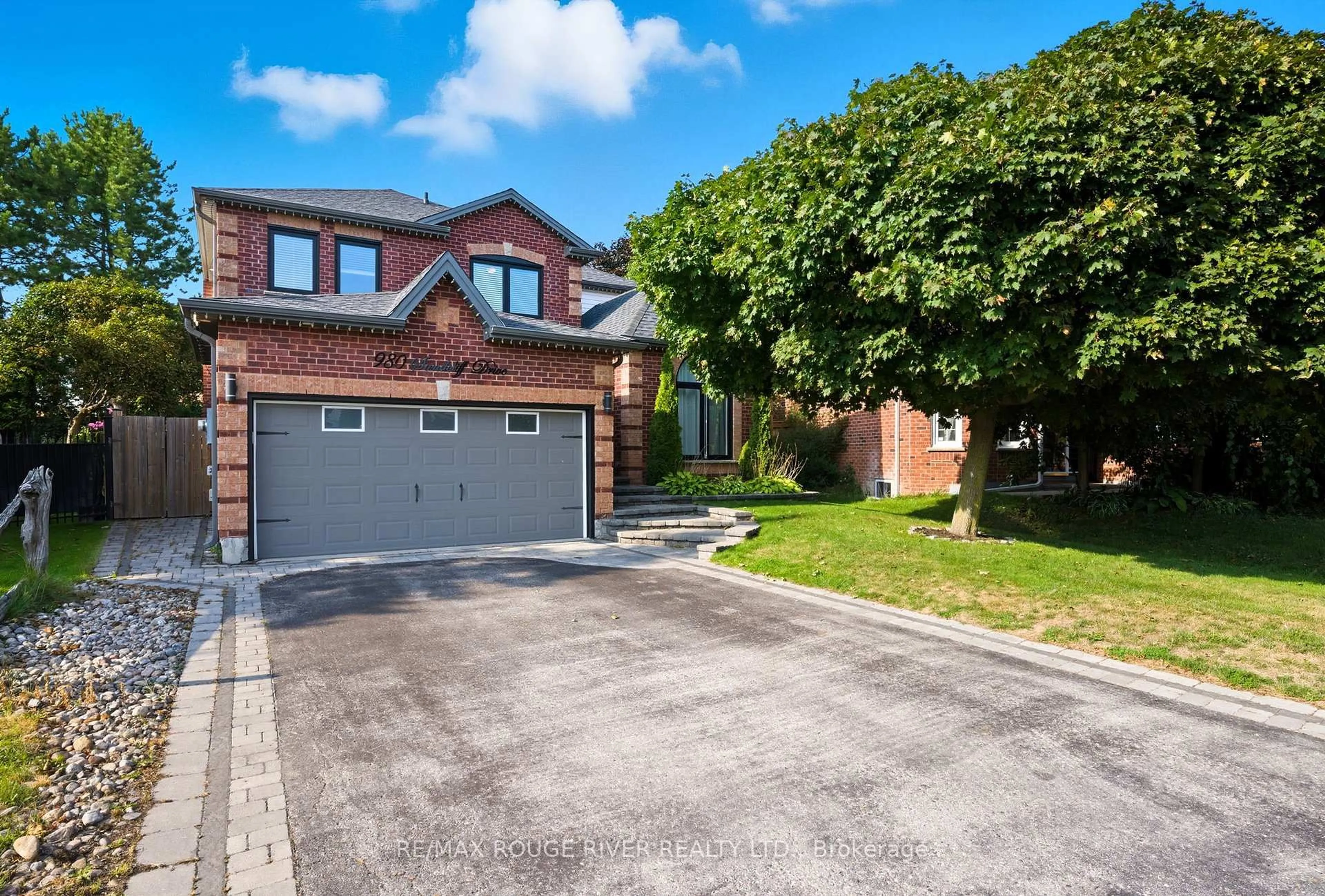 Home with brick exterior material, street for 980 Sandcliff Dr, Oshawa Ontario L1K 2E4