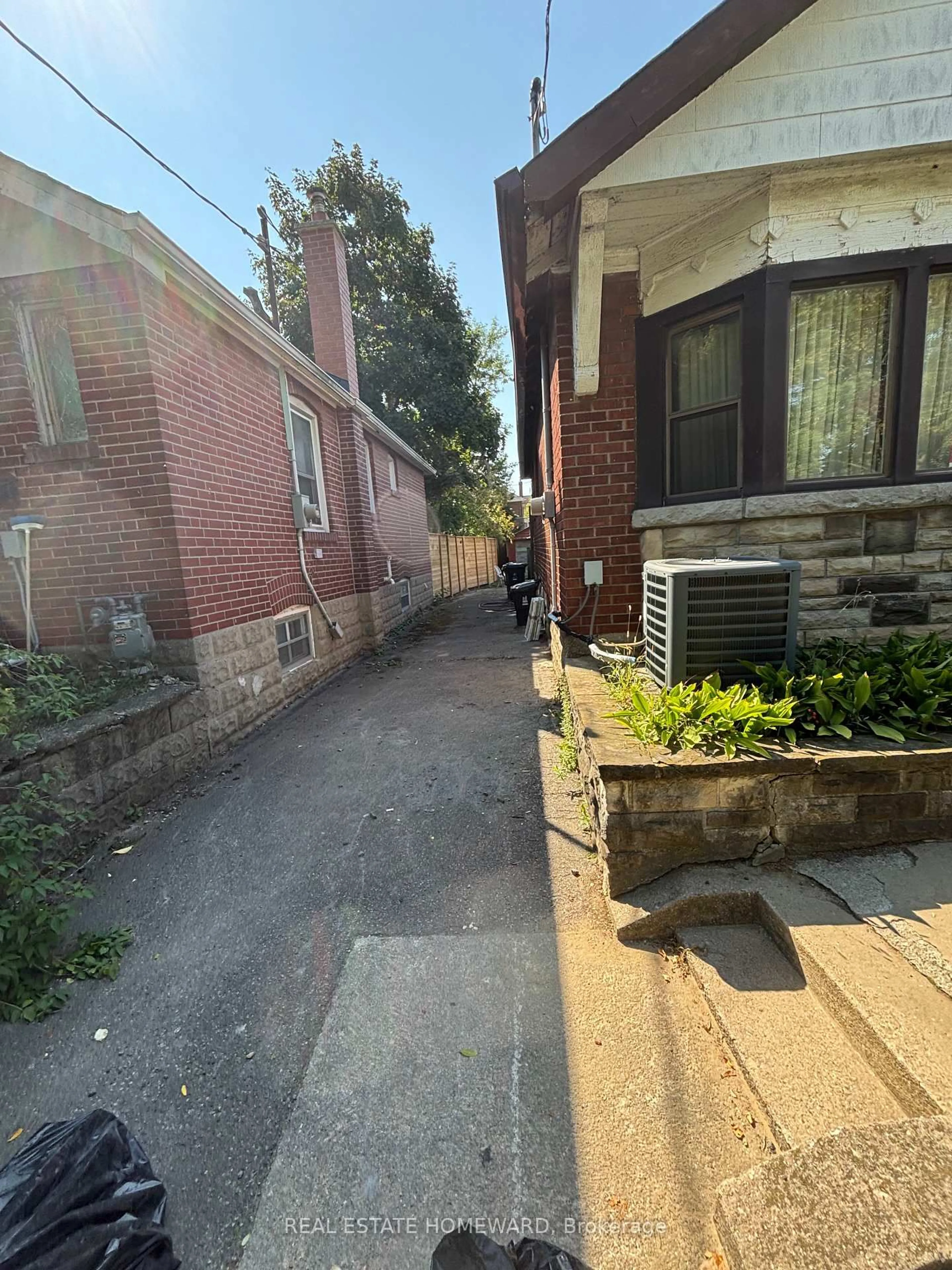 A pic from outside/outdoor area/front of a property/back of a property/a pic from drone, street for 12 St Hubert Ave, Toronto Ontario M4J 3Y9